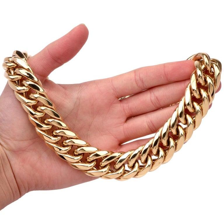 This 1980s chic chain link choker necklace is crafted in 18-karat yellow gold. Consisting of 22mm wide x 6mm thickness Italian made links. Necklace weighs 209.5 grams and measures 18 inches long. Secures with tongue in groove closer and safety