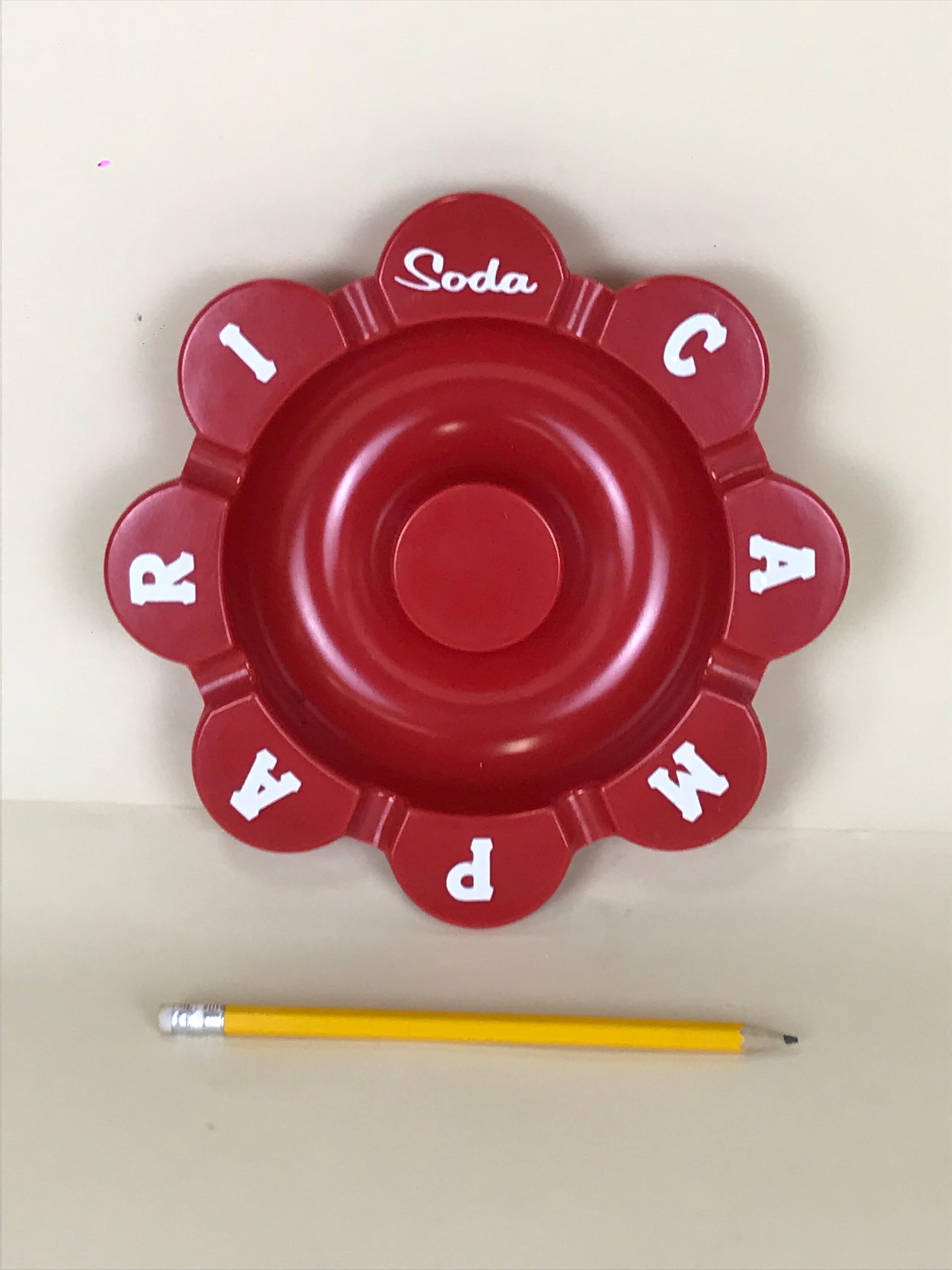 Original Campari Soda advertising ashtray in red rigid plastic designed by Thun Design in 1985/86.

Collector's note:

Campari is an Italian alcoholic liqueur, considered an apéritif obtained from the infusion of herbs and fruit in alcohol and