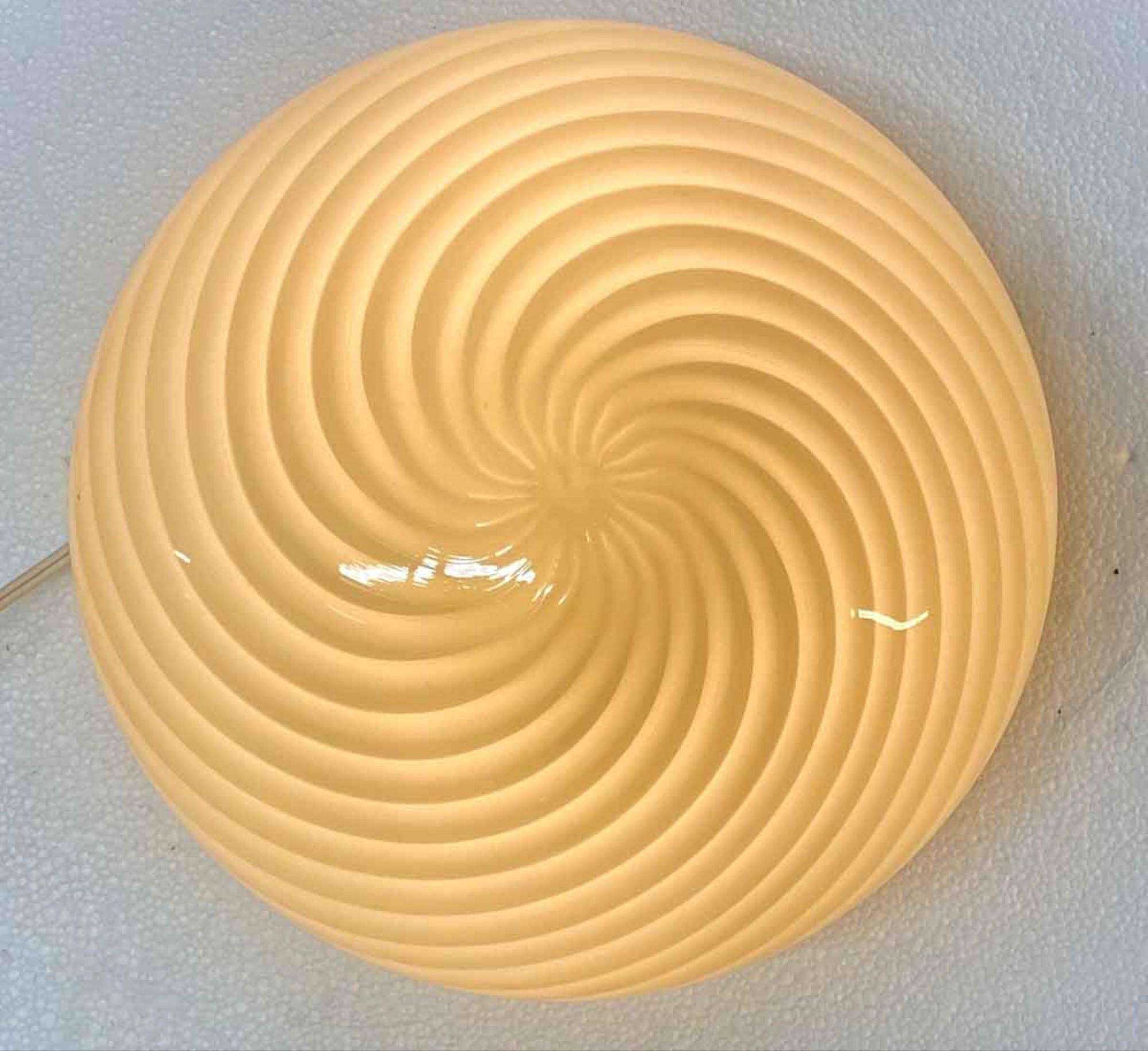1980s hand blown Mid-Century Modern round glass fixture by Vetri Murano. This light requires two bulbs, 60 watts max. Measures: 15.5 in. Cleaned and rewired. Small quantity available at time of posting. Priced each. Please inquire. Please note, this