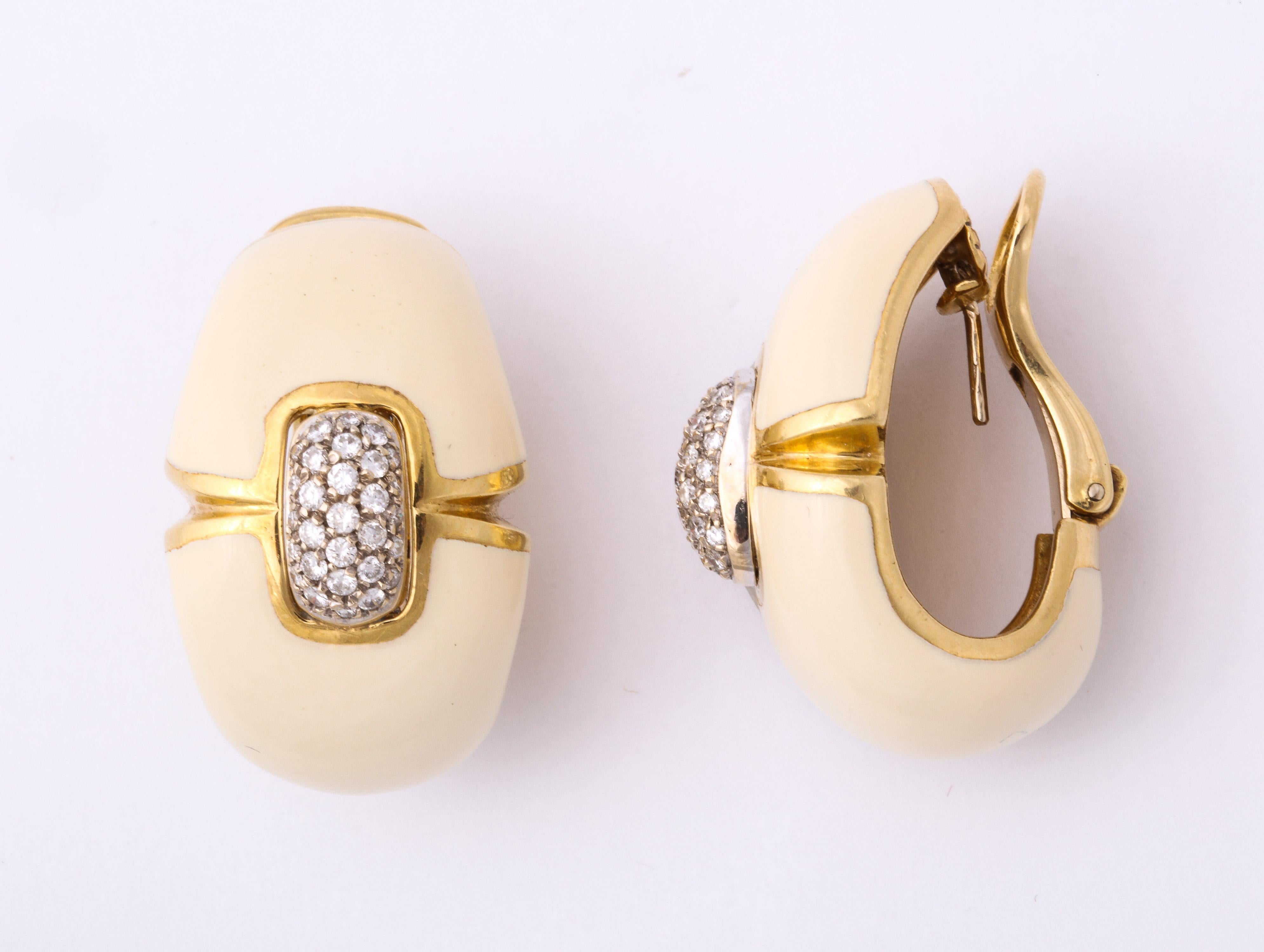 One Pair Of Ladies 18kt High Polish Yellow Gold Earrings Decorated With Ivory Color Enamel And Embellished With Numerous Full Cut Diamonds Weighing Approximately 2 Carats Total Approx Weight.Designed With Very Fancy And Expensive Clip On Closures.,