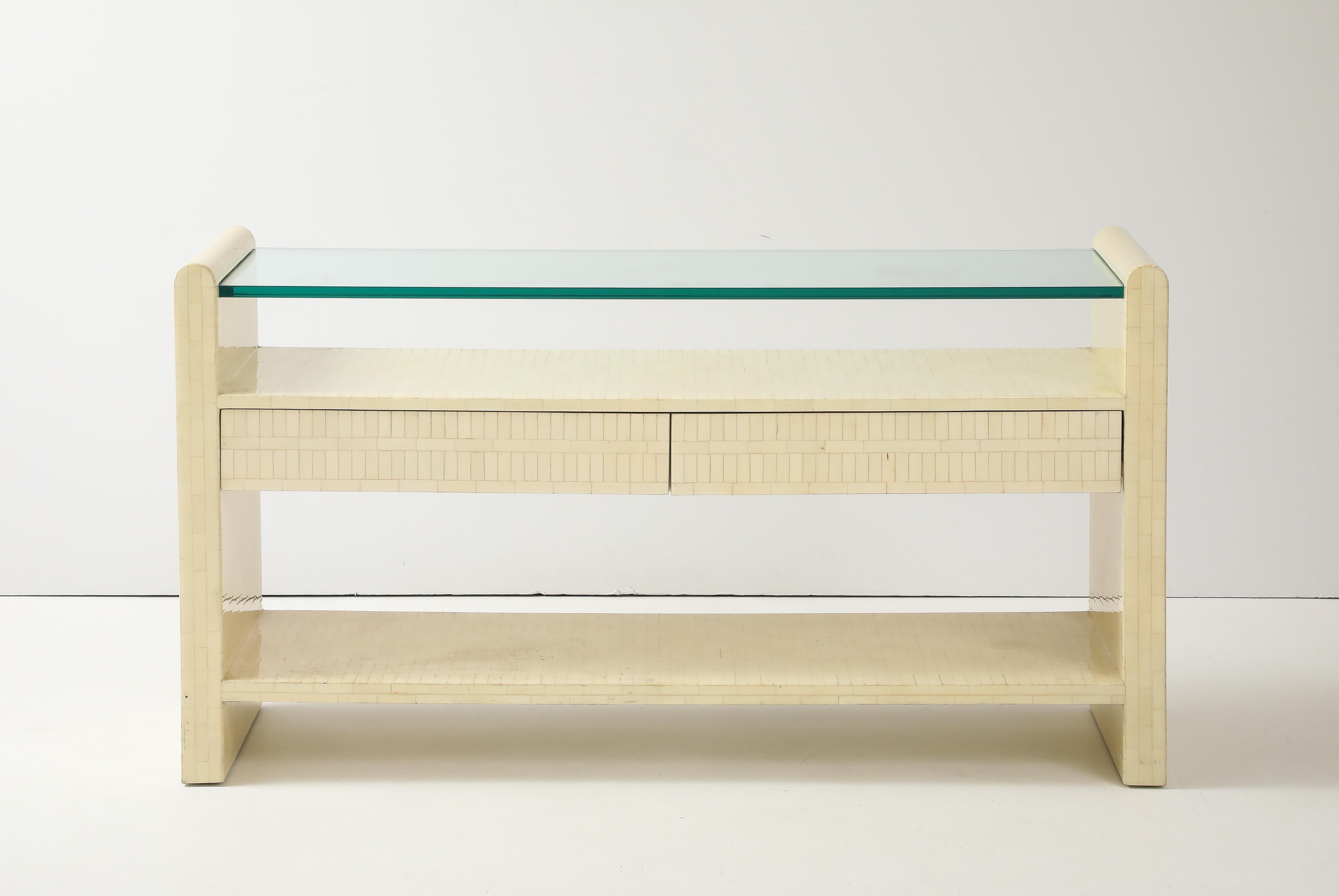 Wonderful sleek Mid - Century Modern  Ivory colored tessellated bone console table.
The clean - lined table is in wonderful vintage condition and has two drawers and a  3/4
