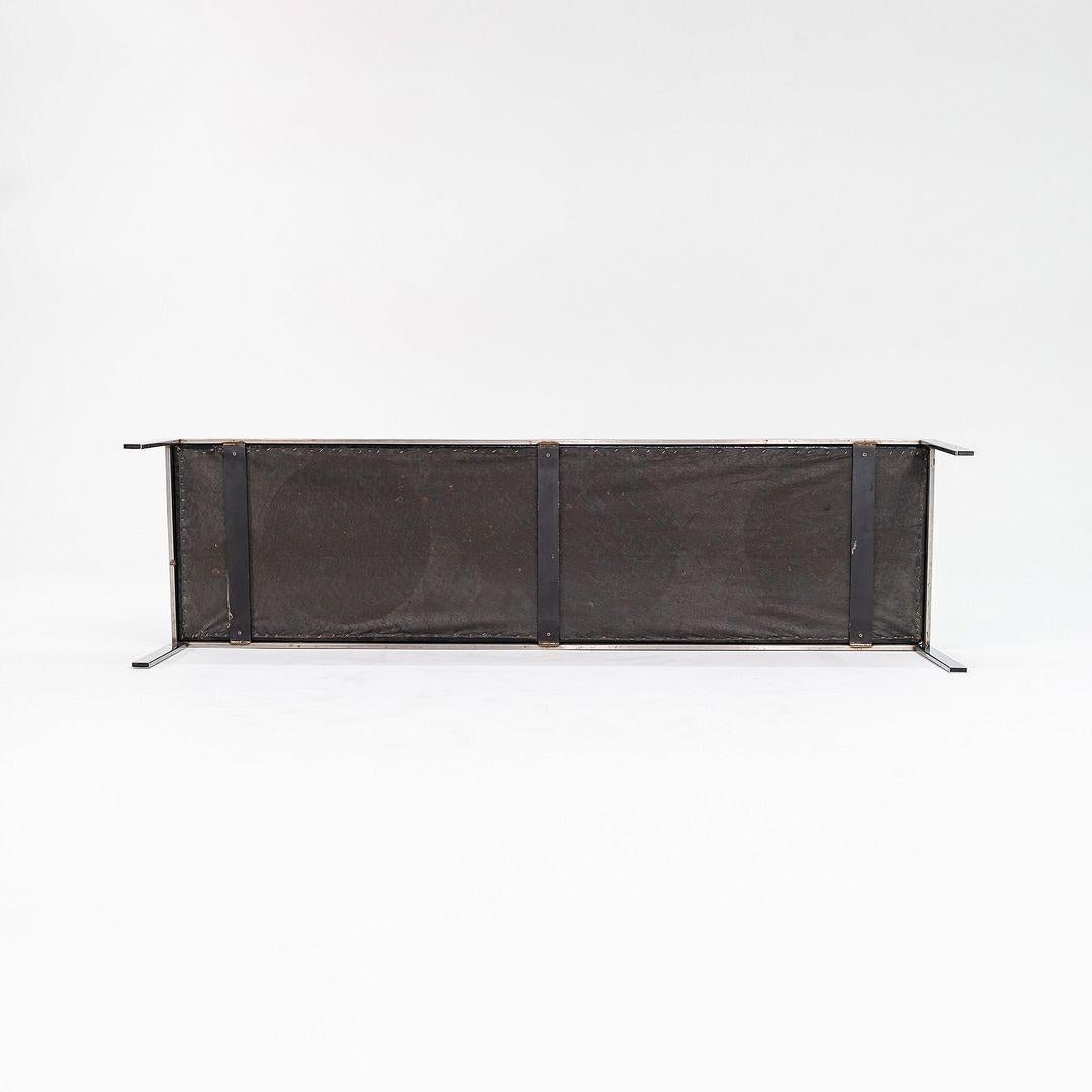 This is a polished stainless steel bench from the 1980s, upholstered in black vinyl. It was designed by Jacob Epstein for Cumberland Furniture. The bench came from a Law Office designed by SOM Architects in NYC. 
 
 This bench measures 72.25 inches