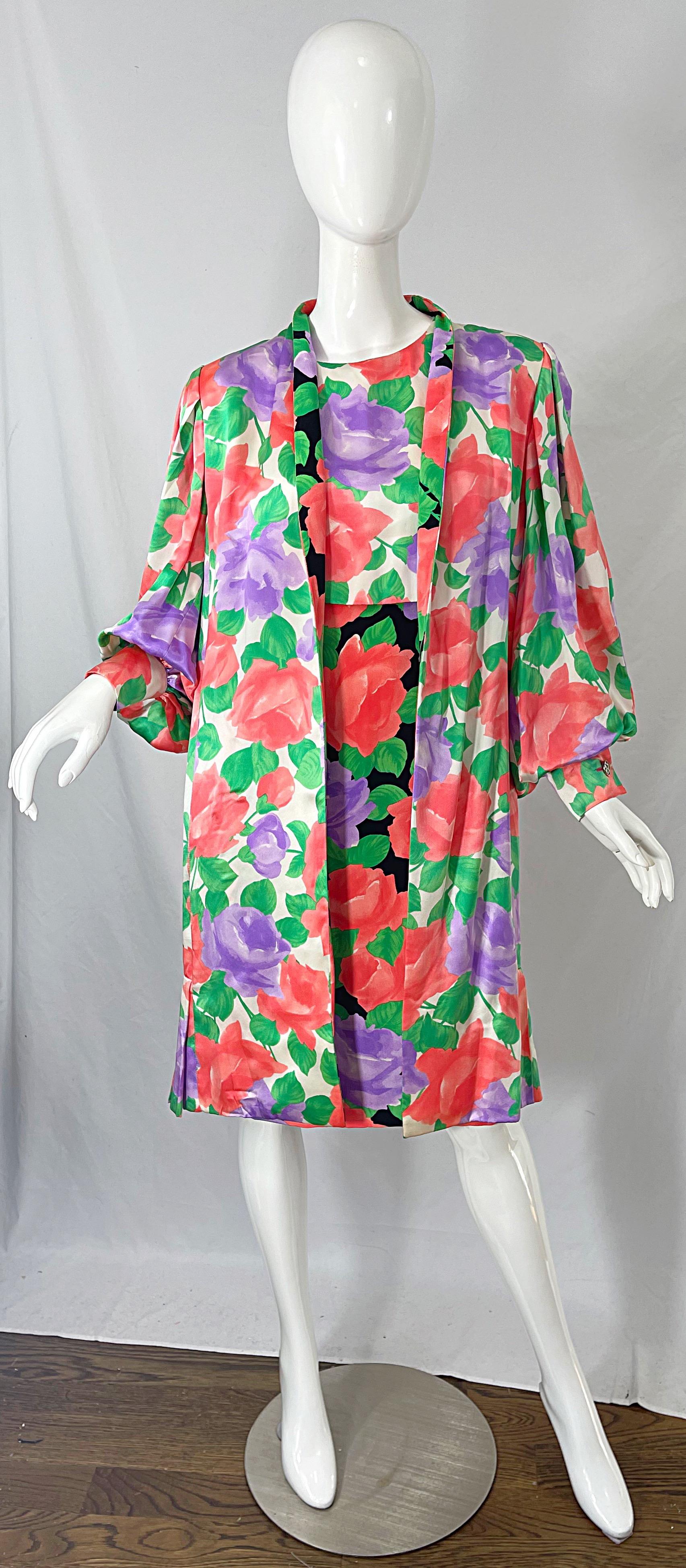 Fabulous 1980s JAMES GALANOS Couture rose printed long sleeve silk dress and matching swing jacket ! The dress features vibrant colors of black, pink, coral, purple, green and white throughout. Hidden zipper up the back with hook-and-eye closure.