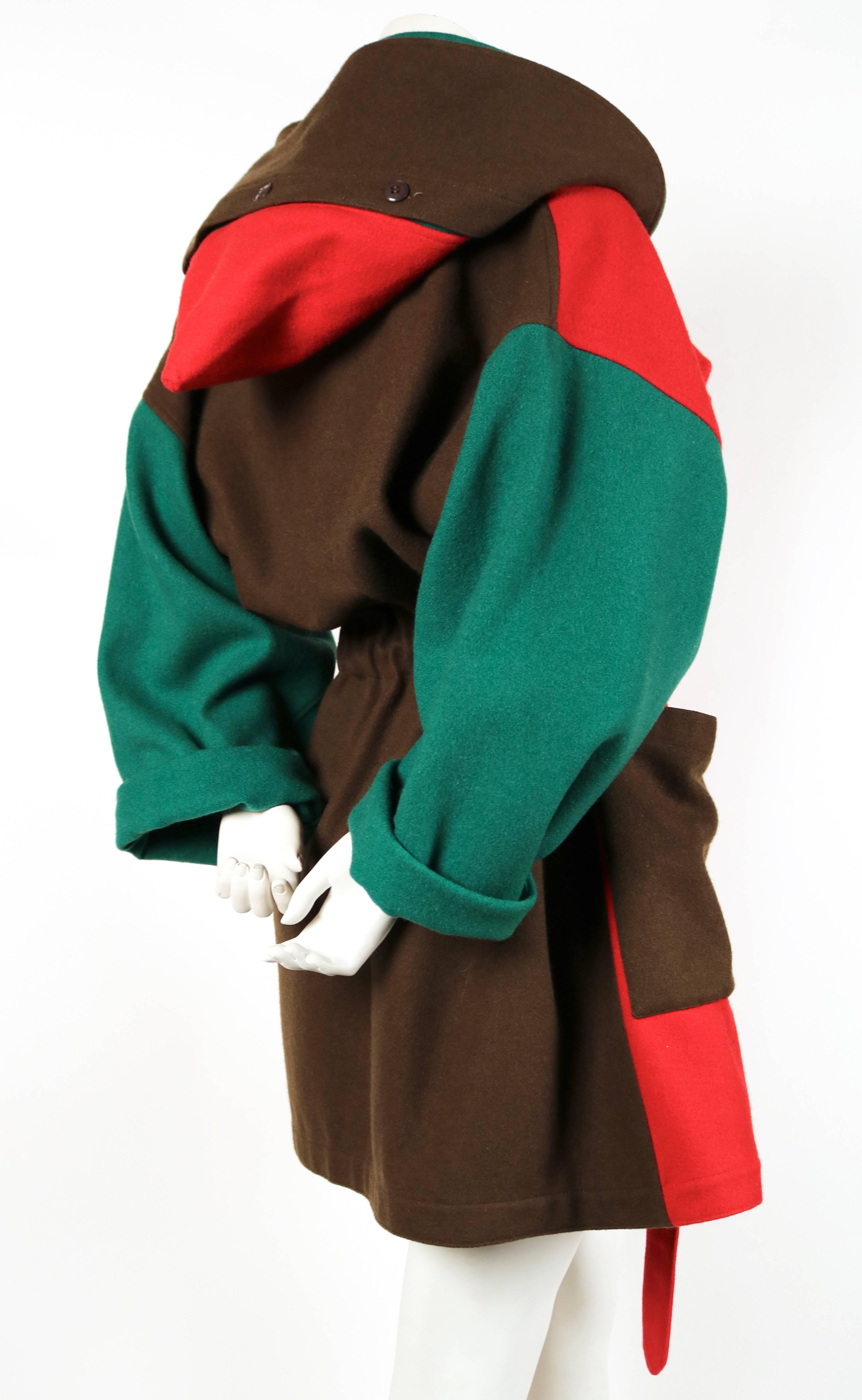 Vivid color-blocked wool felt coat with large hood from Jean Charles de Castelbajac dating to the late 1980's. Fits many sizes due to oversized cut. Length is 34
