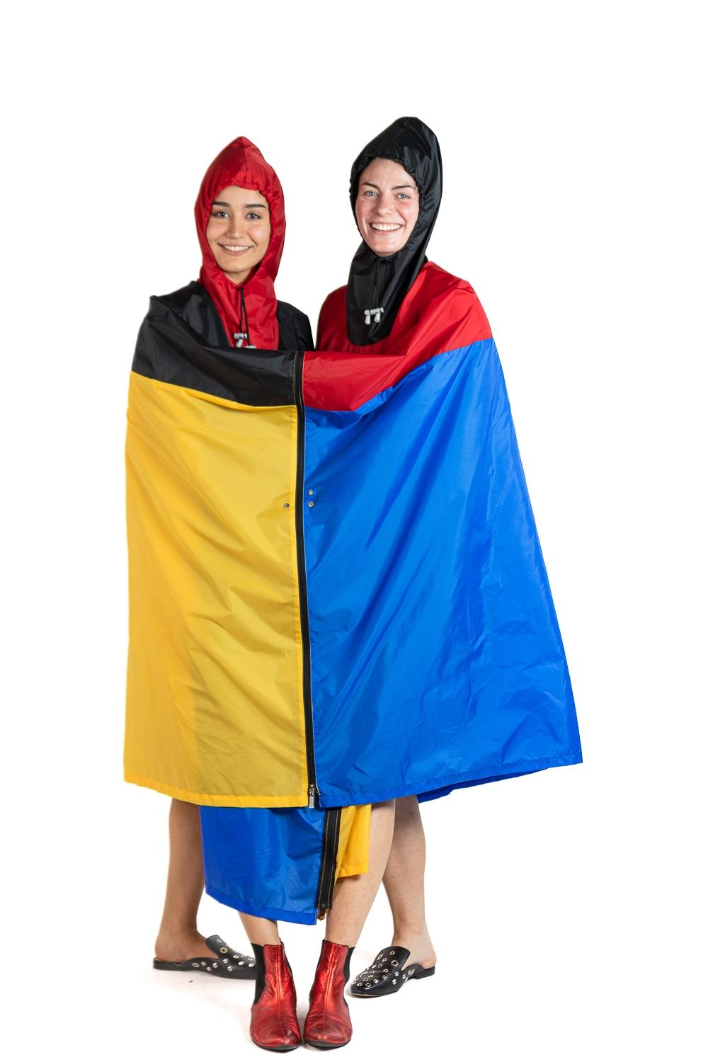 This fun and whimsical design has been featured in numerous books and exhibitions. Including most recently the Exhibit on the 1980s at the Museum of Decorative Arts Paris. The poncho can be zipped apart into two garments, as well as into a line up