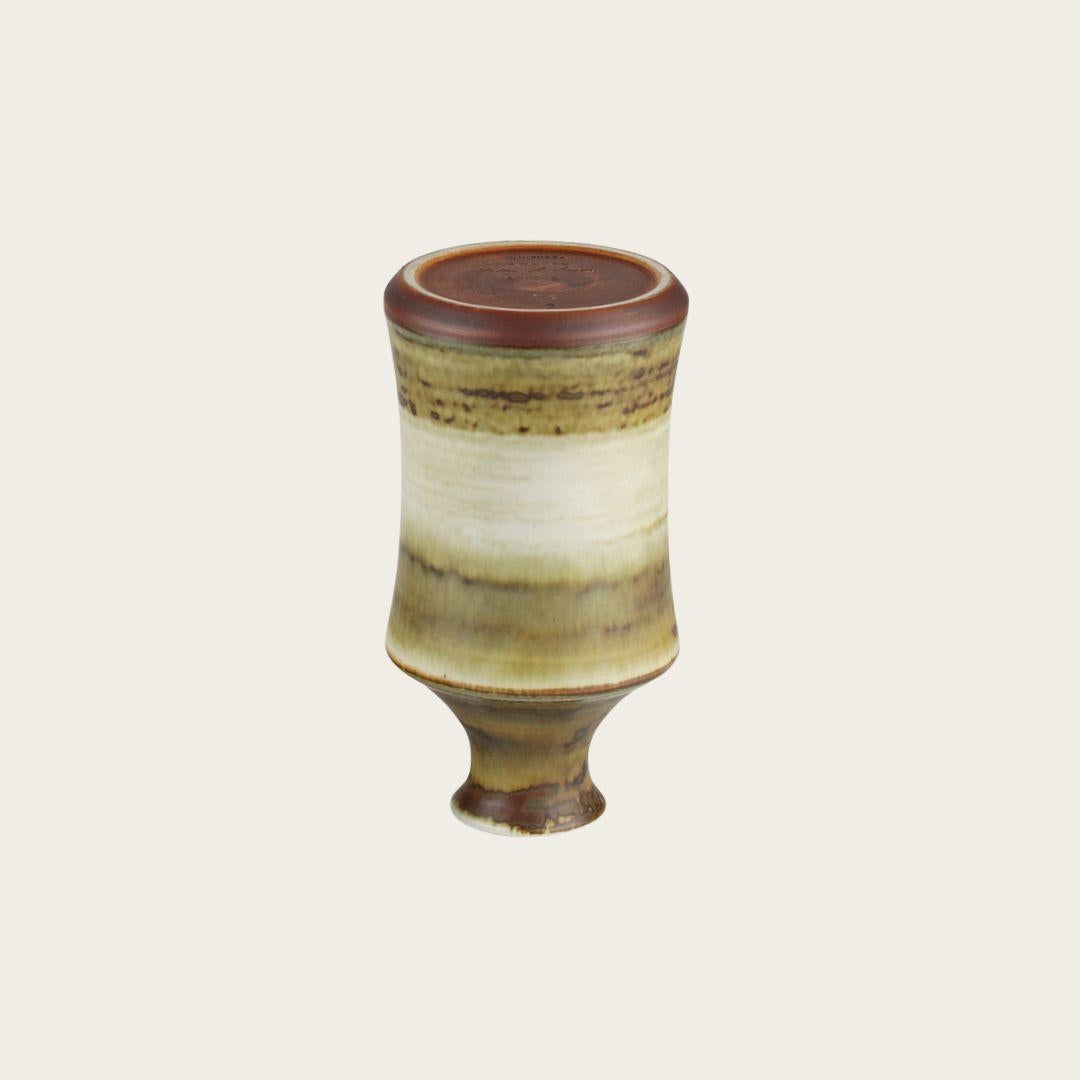 1980s, Sweden. This hand-turned vase is signed on the underside by artist John Andersson (1899-1969), a prominent figure in 20th-century Swedish ceramic design. Andersson was a key designer for the Höganäs factory.