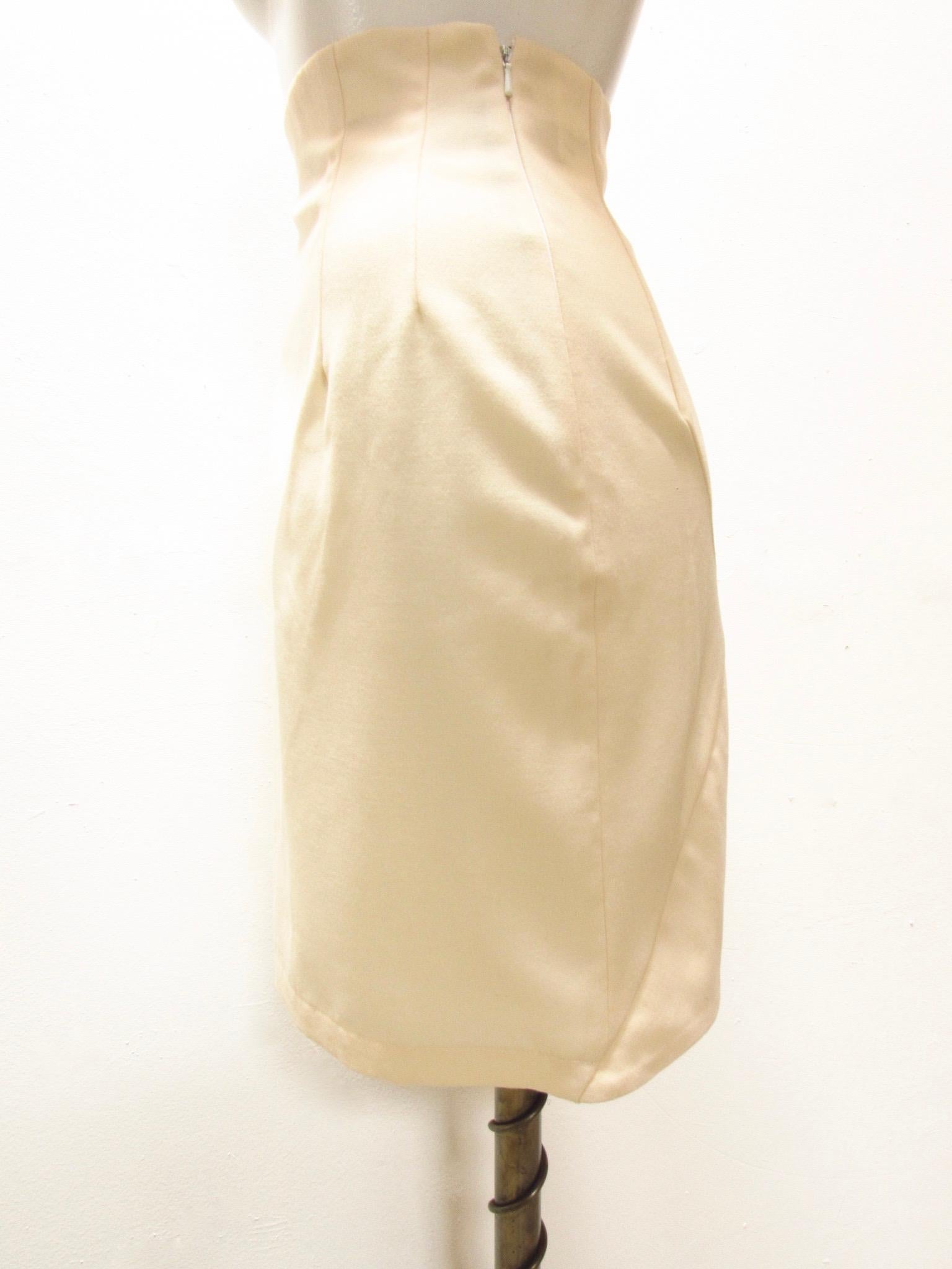 Rare and iconic 1980's London Label John Galliano cream wool pencil skirt with geometric paneling and a hidden zip.