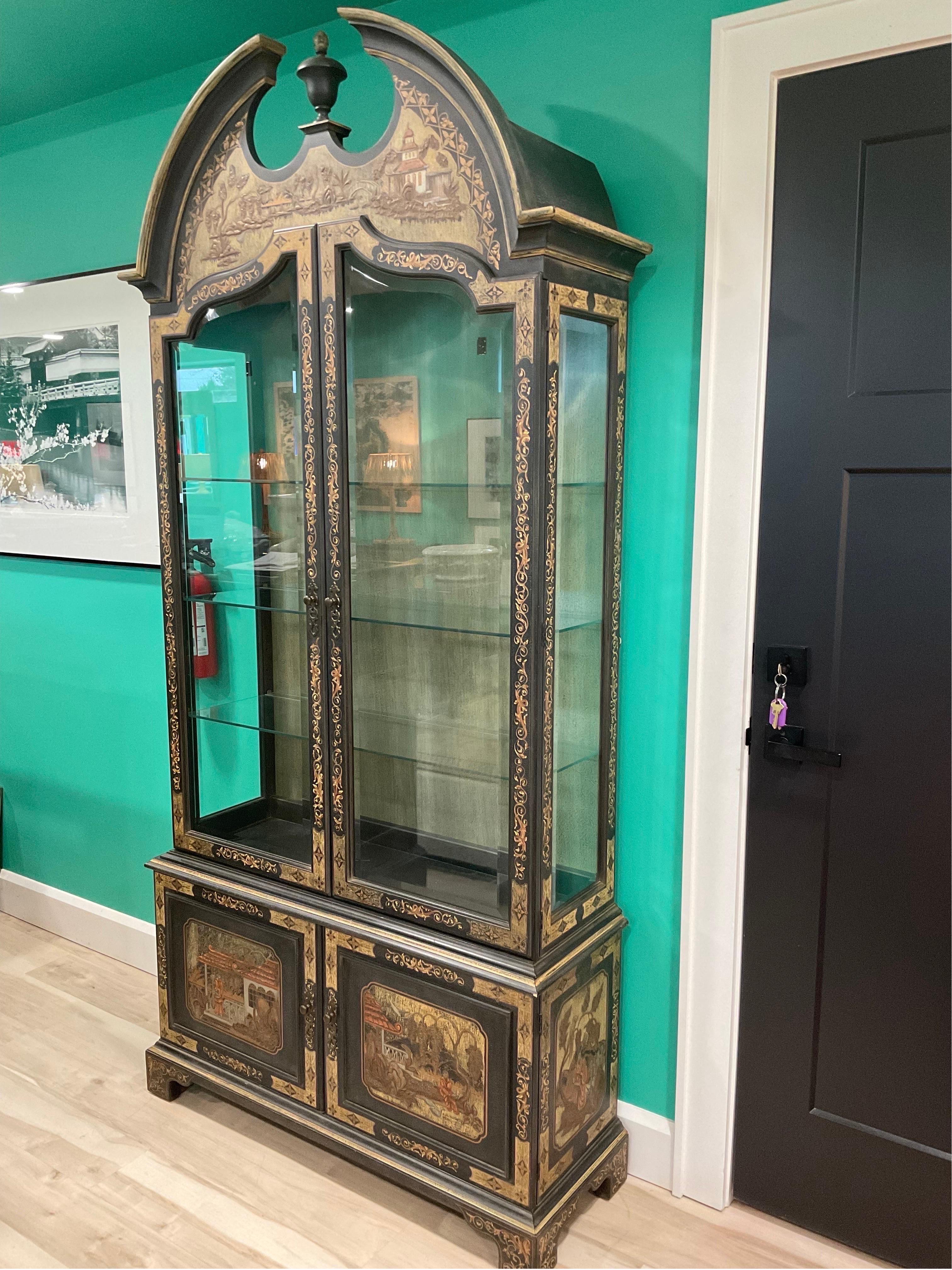Absolutely pristine one owner example of this broken arch pediment Chinoiserie Case from famed John Widdicomb. Magnificent hand painted surfaces in extraordinary detail. Dark forest green wash with black and cream highlights provide the base for