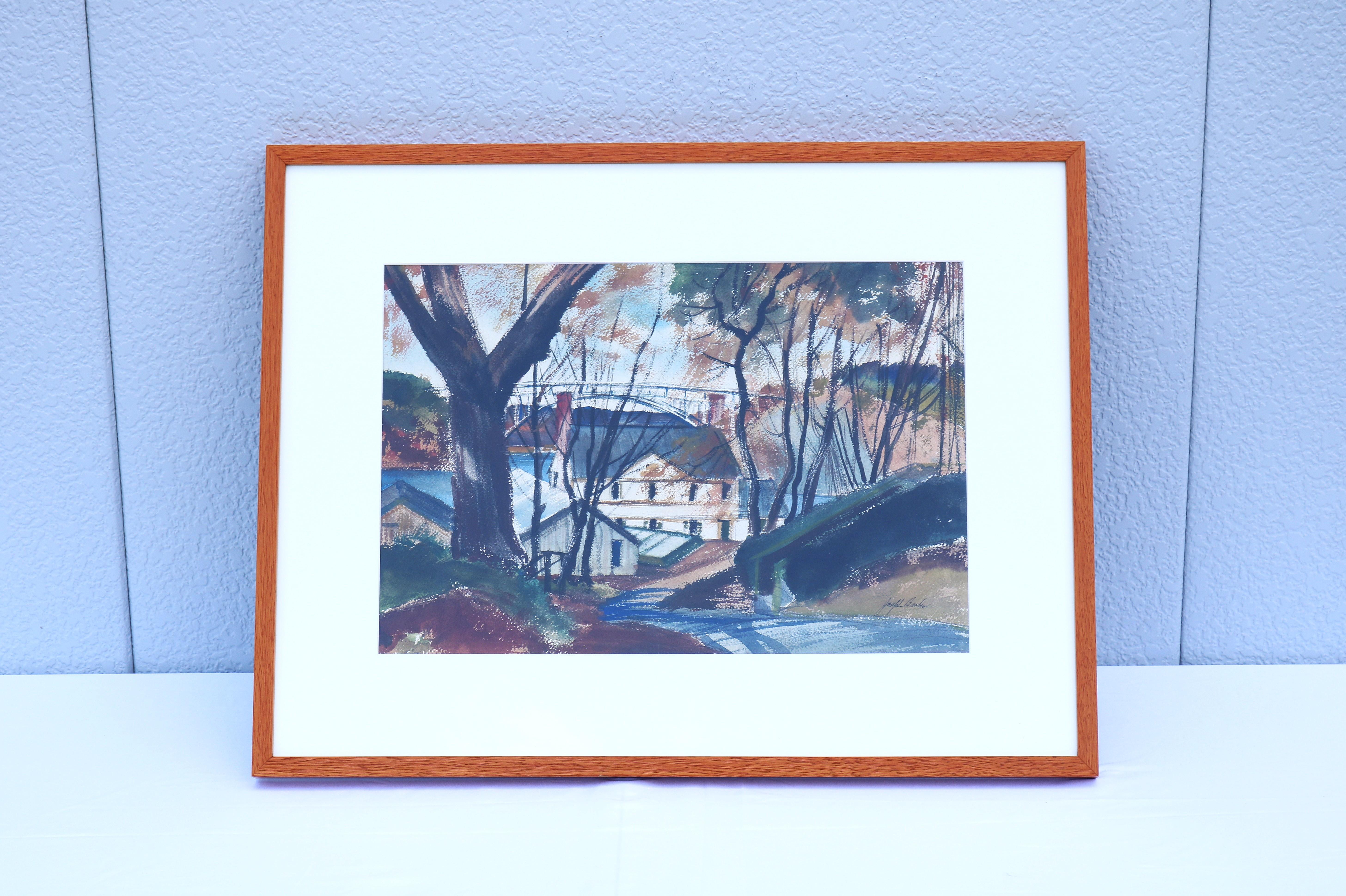 Fabuleux paysage américain de 1980-1990 encadré par Joseph Barber, peinture au pastel et à l'aquarelle sur papier. La signature de l'artiste est visible dans le coin inférieur droit.
L'œuvre d'art représente une route de village ombragée par des