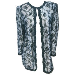 Chaqueta de encaje y lentejuelas negras y plateadas Judith Ann, años 80