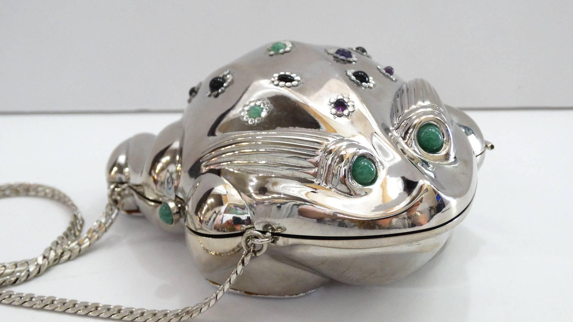 No need to kiss anymore frogs- your price charming has arrived (in bag form, that is!) Add some novelty to your evening looks with our amazing 1980s Judith Leiber silver bullfrog bag! Glossy silver metal bullfrog accented with green gem spots and