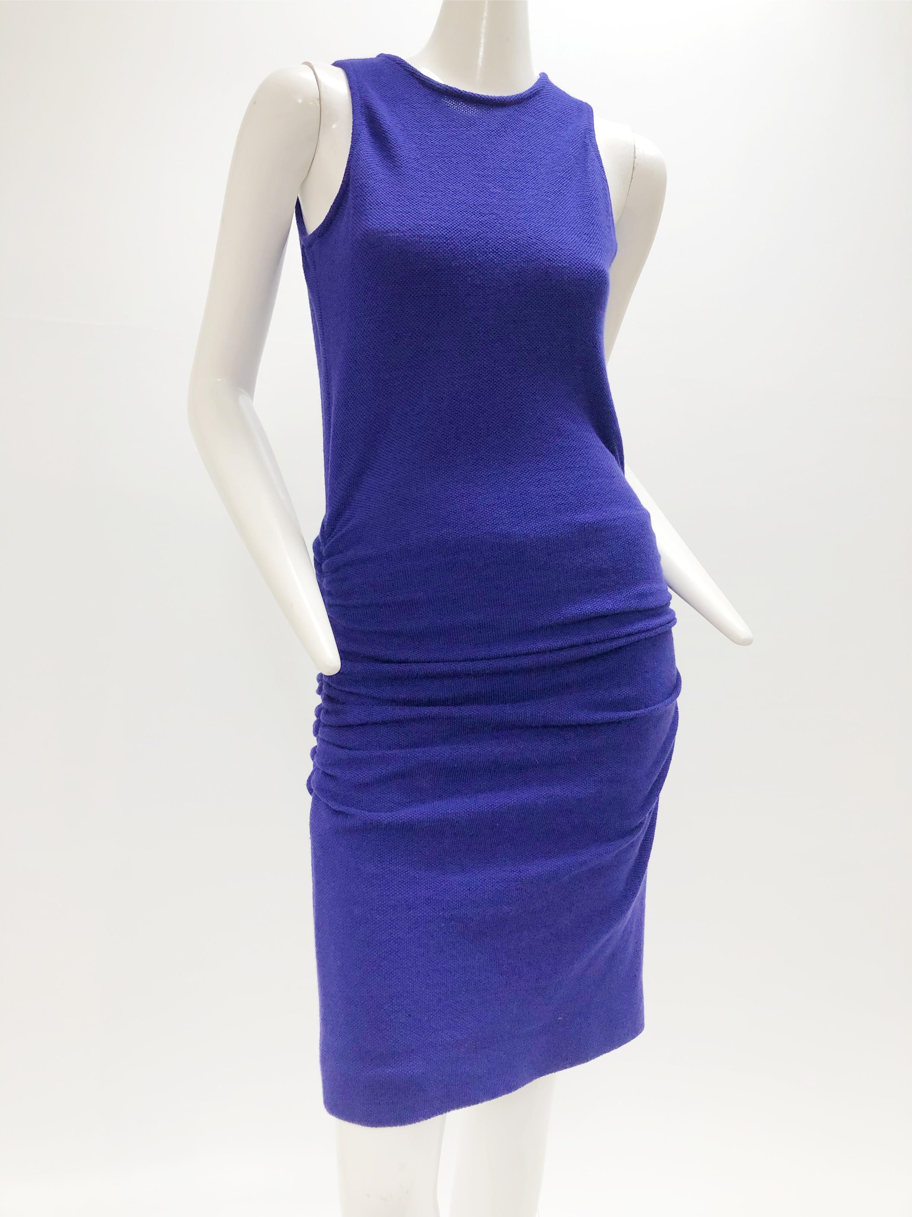 1980s Karl Lagerfeld royal purple double knit wool body-conscious sleeveless dress with back double-button closure. Trademark Lagerfeld fan buttons. Fits approximately a US size 0-2.