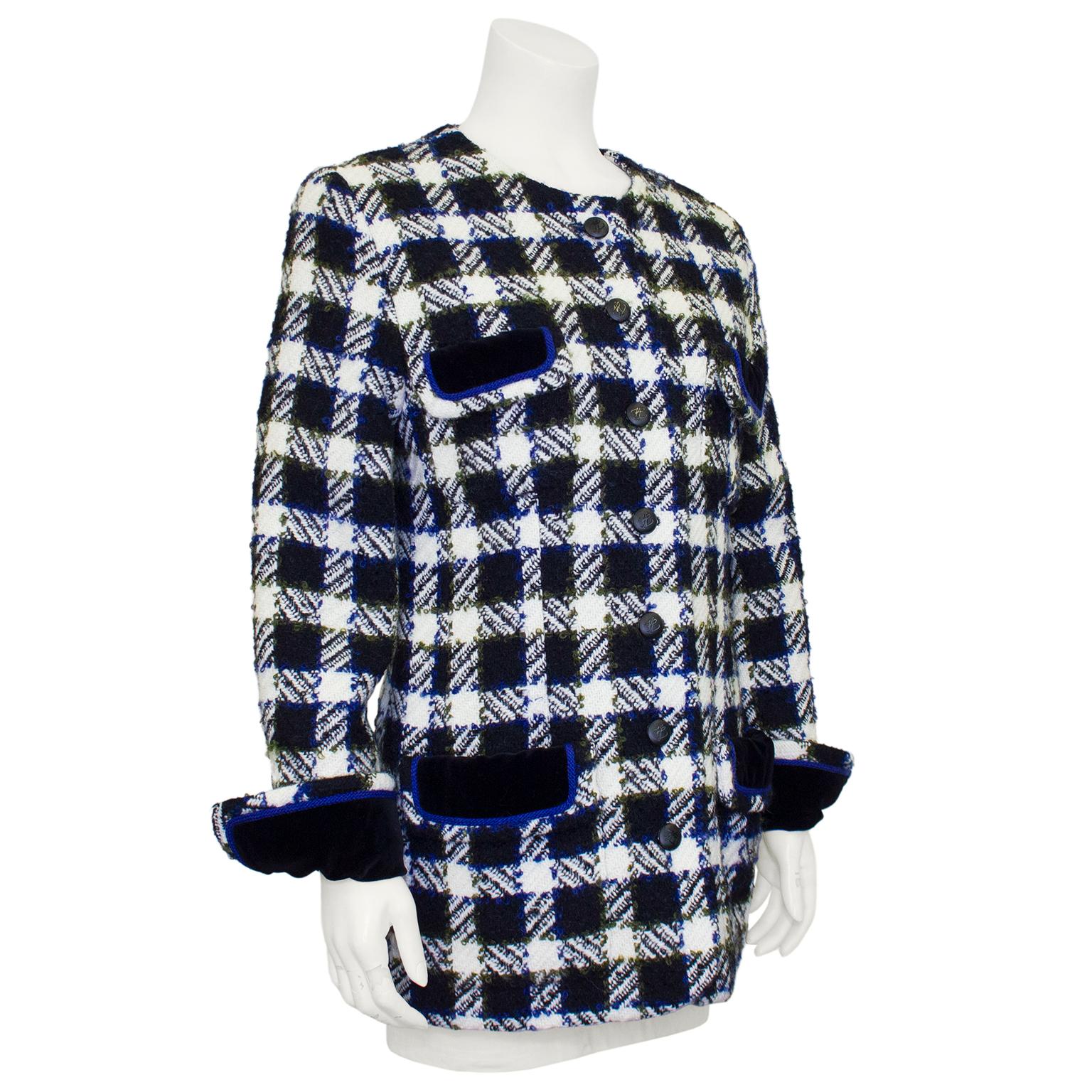 Perfect for fall and winter Karl Lagerfeld jacket from the 1980s. Thick wool black and cream houndstooth with olive green and royal blue looped yarn throughout adding colour and texture. Collarless with round black plastic buttons engraved with KL.