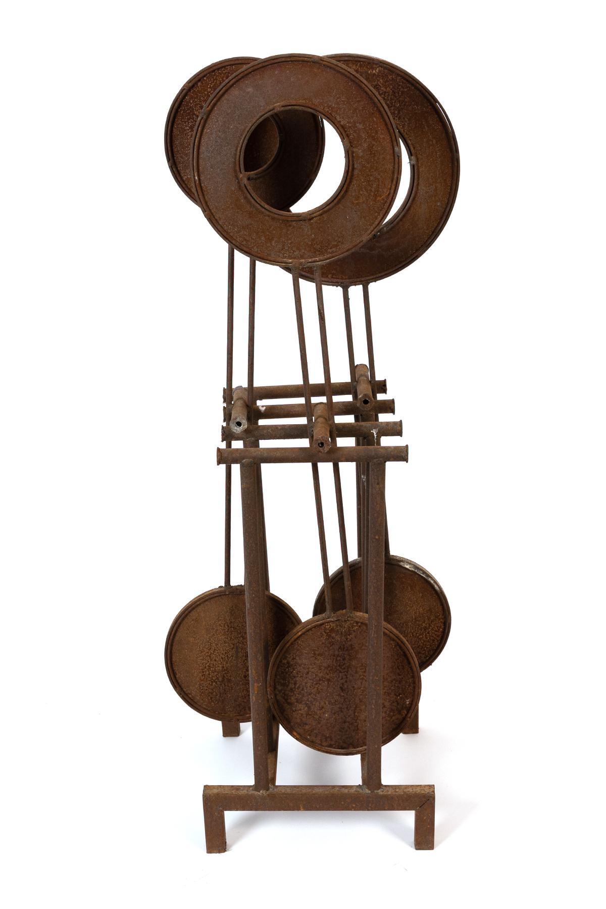 Fabulous abstract iron sculpture circa mid 1980s which features moving Kinetic elements that gently rock back and forth like upright pendulums. This can be used indoors or out.
Unsigned.