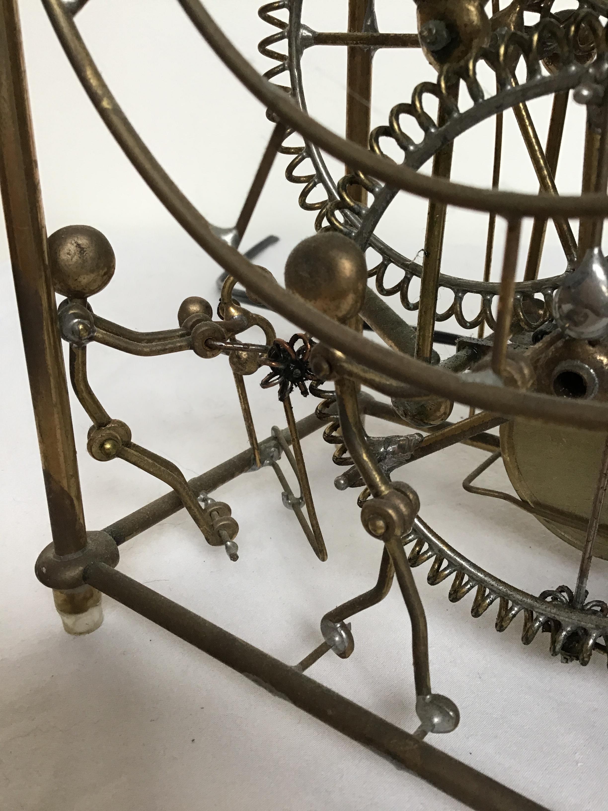 Brass 1980s Kinetico Six Man Clock by Gordon Bradt