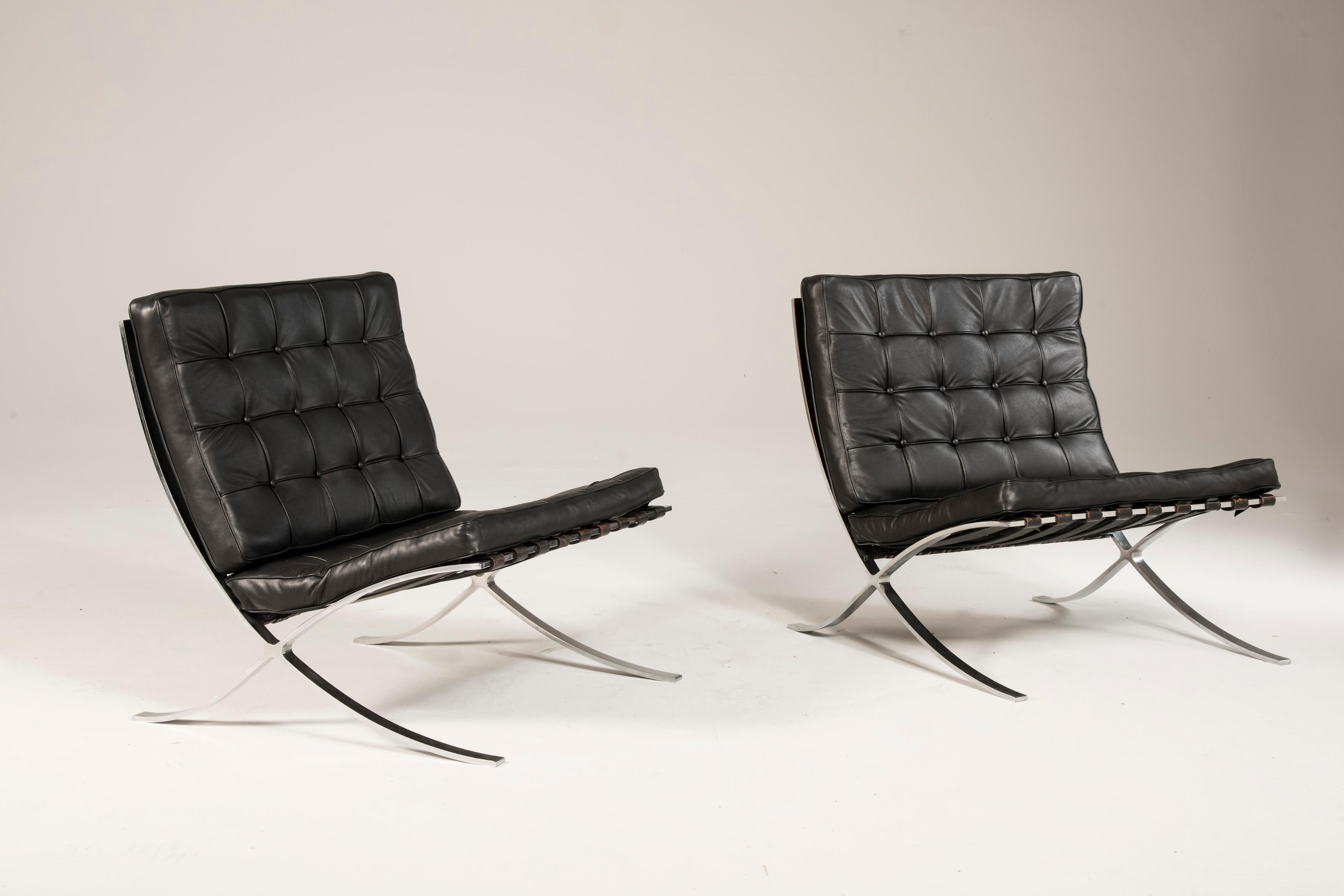 Barcelona armchairs, 1980s production, set of two armchairs. Excellent conditions. They feature original sticker. The leather cushions have been renewed with 