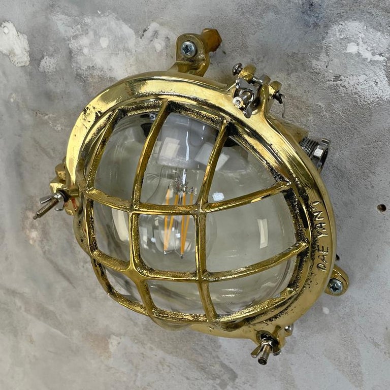 1980's Korean Brass Circular Bulkhead Light with Cast Cage and Glass Shade For Sale 6
