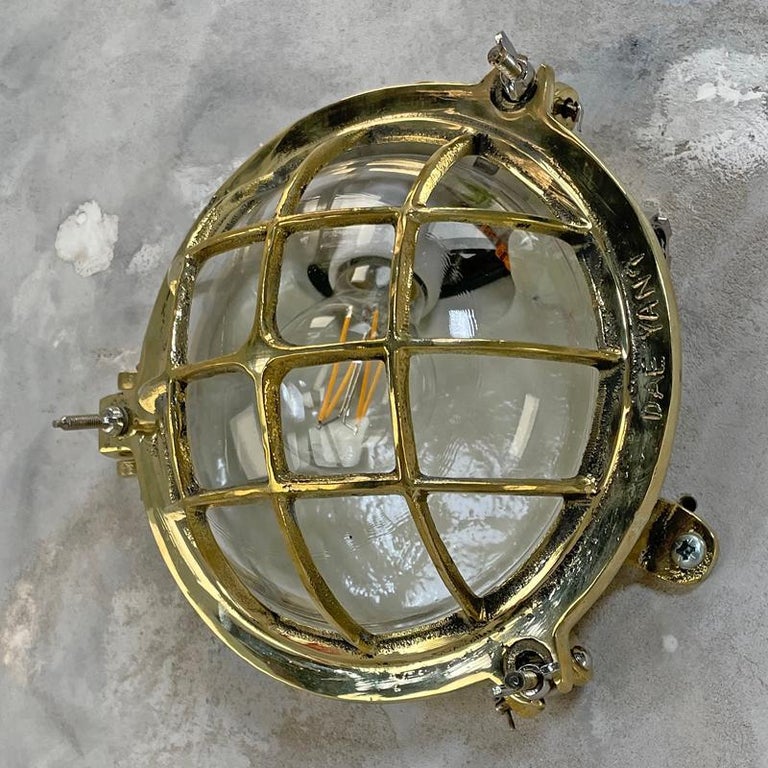 1980's Korean Brass Circular Bulkhead Light with Cast Cage and Glass Shade For Sale 10