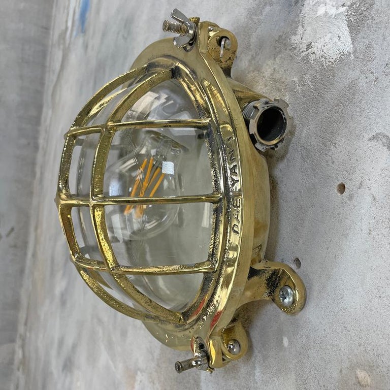 1980's Korean Brass Circular Bulkhead Light with Cast Cage and Glass Shade For Sale 12