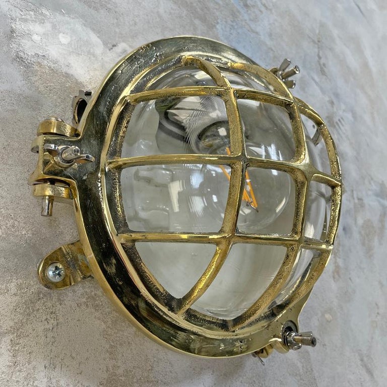 1980's Korean Brass Circular Bulkhead Light with Cast Cage and Glass Shade For Sale 13