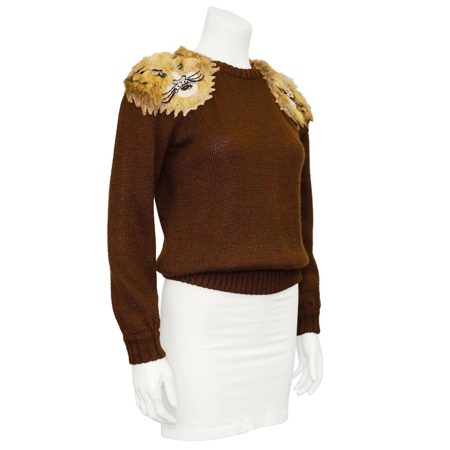 Known for their incredible knits featuring animals, this sweater is the ultimate Krizia piece. Perfect with jeans, the lion head appliques on the shoulders are detailed with sequin eyes, noses and whiskers. Made of half wool and acrylic, the brown