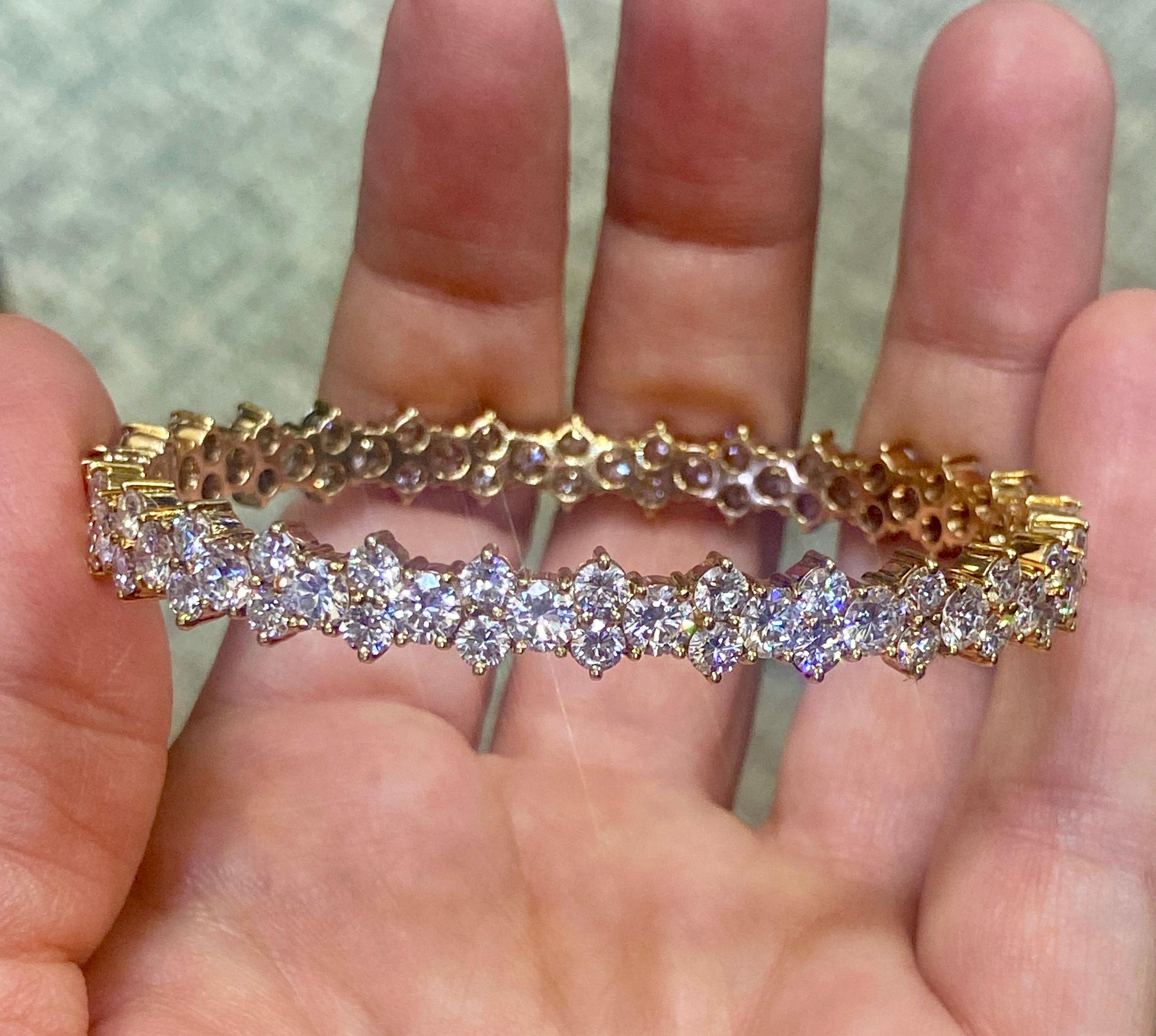 This striking Kutchinsky bangle from 1980s consists of a total of 13.34 carats F colour VVS clarity diamonds. A beautiful addition to any collection to be worn day and night.