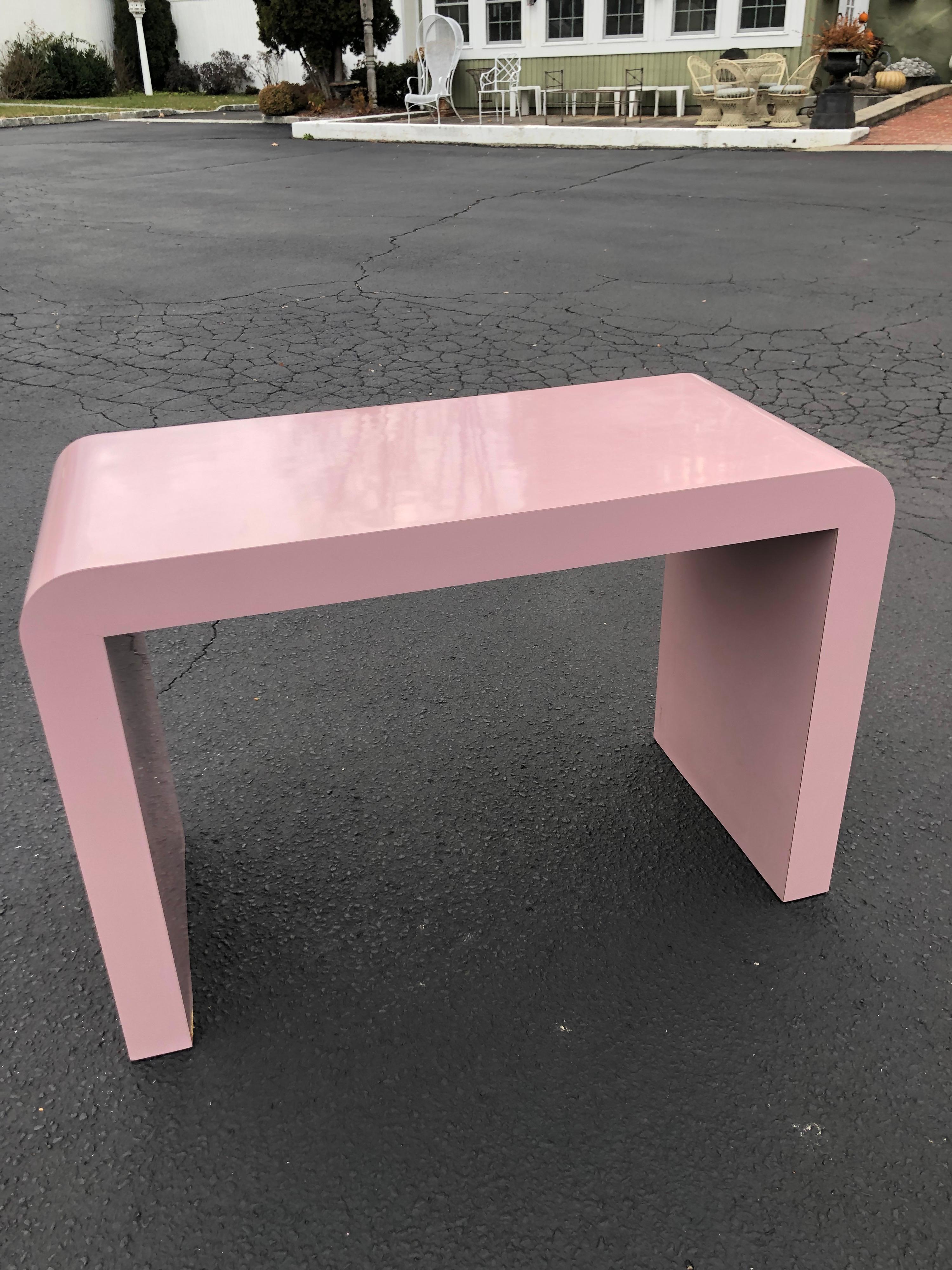 Fabulous Post Modern Laminate piece in Blush Pink. Iconic 80's design and color.
Use as a desk or as a console or entry table. Some wear to laminate see photos.