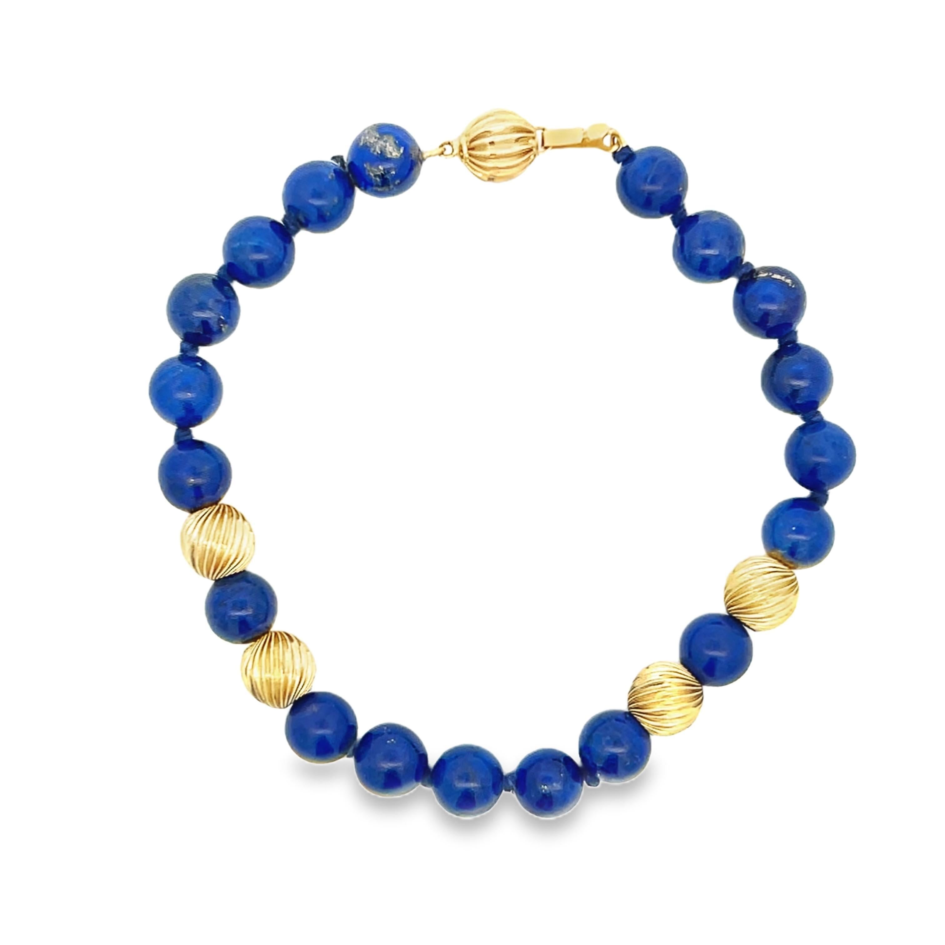 This is a gorgeous lapis lazuli bracelet with beautiful 14k yellow gold spacer beads. The lapis is a very rich shade of blue with incredible depth to the color. So much depth that looking at them is reminiscent of the deep blue ocean or outer space.