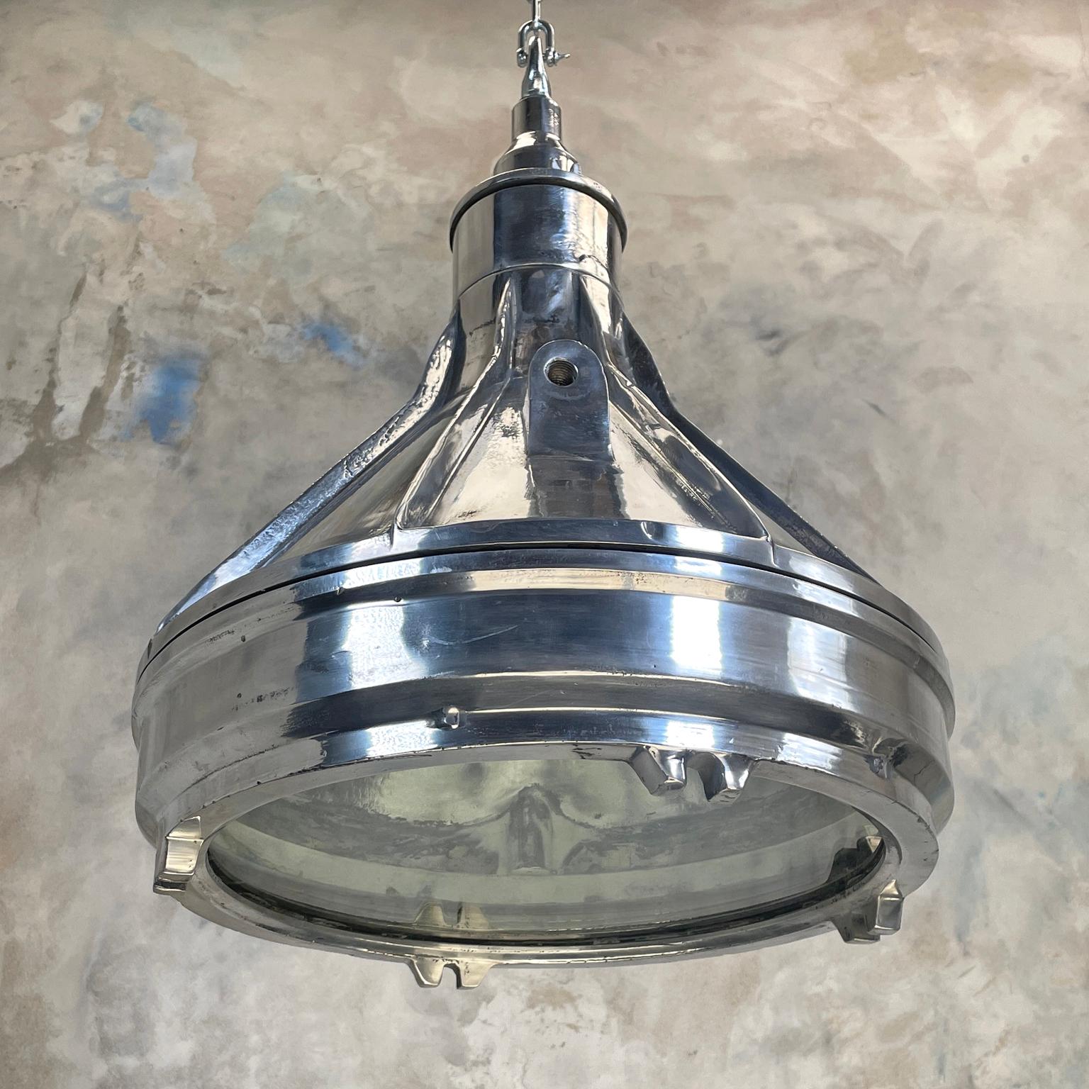 Large vintage industrial explosion proof aluminium ceiling pendant lighting, reclaimed from supertankers and cart ships.

Original and authentic metal light fixtures perfect for creating contemporary industrial style interiors. Stunning kitchen