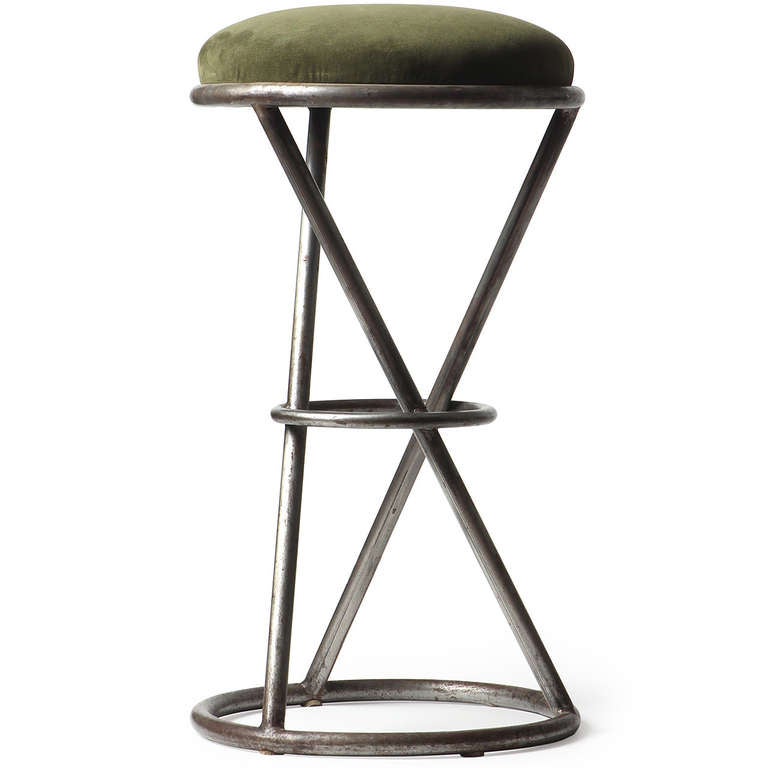 Art Deco style geometric and dramatic hourglass-shaped stools made of large-gauge tubular steel with round cushions upholstered in a moss green ultra-suede. Several available.