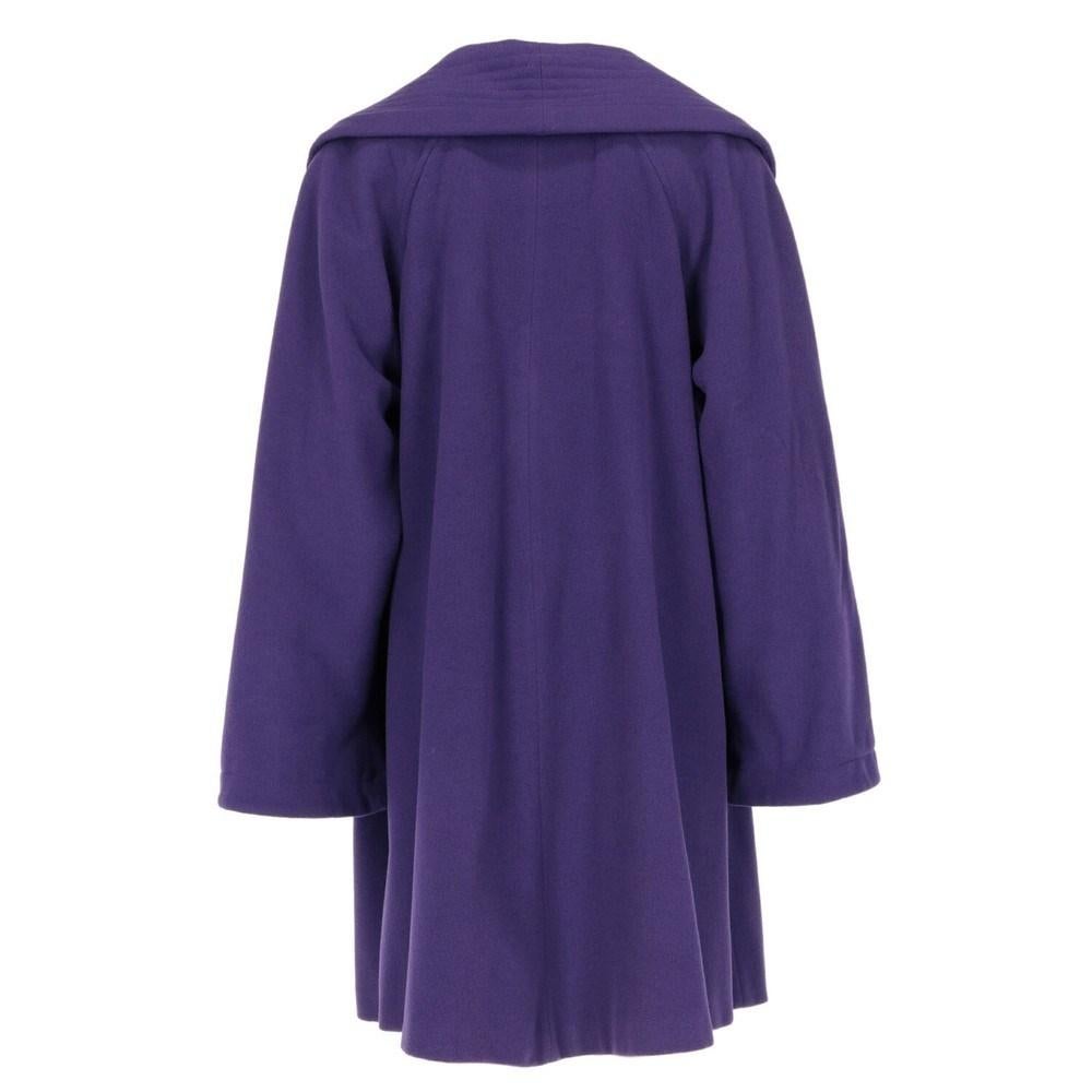 “Laurapiù” by Laura Biagiotti purple wool coat. Shawl collar, front closure with fabric-covered single button, two frontal welt pockets. Over fit.

Size: 42 IT

Flat measurements
Height: 102 cm
Bust: 60 cm
Shoulders: 42 cm
Sleeves: 65 cm

Notes: The