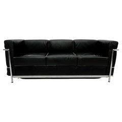 1980s LC2 Black Leather Chrome Frame Sofa by Le Corbusier for Alivar Italy