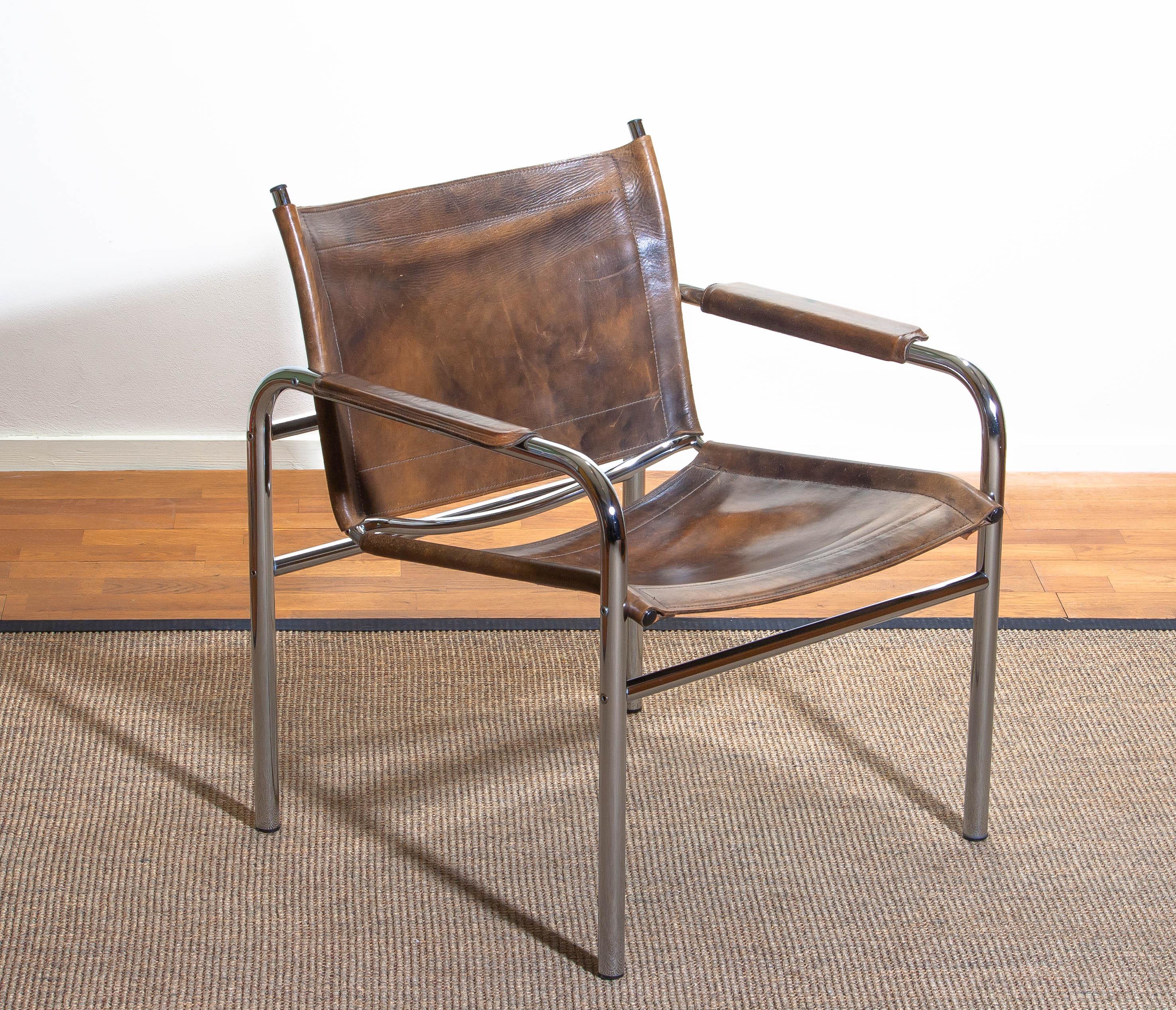 Beautiful armchair, model Klinte, designed by Tord Björklund, Sweden. The chair has a tubular chromed steel frame with brown-taupe leather back / seating and armrests with a beautiful patina.
Period 1980.

Note: We have two of these chairs in