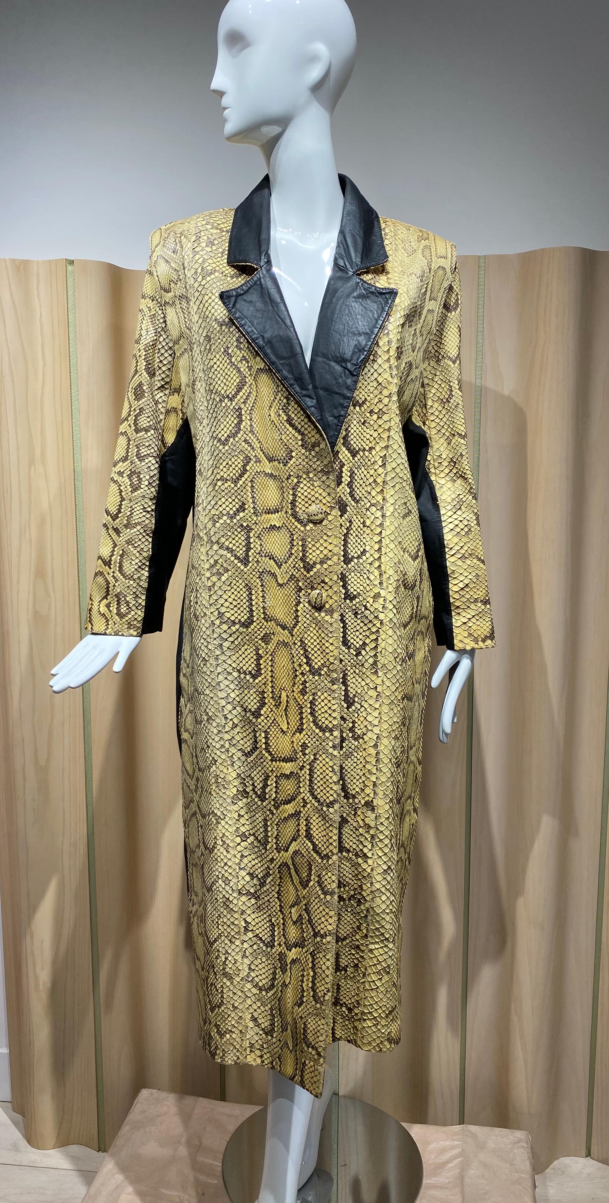 1980s Snake skin leather coat. Beautiful condition. Coat is lined.
Size: Large
Measurement:
Bust: 39”  / Waist: 39”.  / Hip: 39”.  Coat Length: 48”     / Sleeve length: 23”