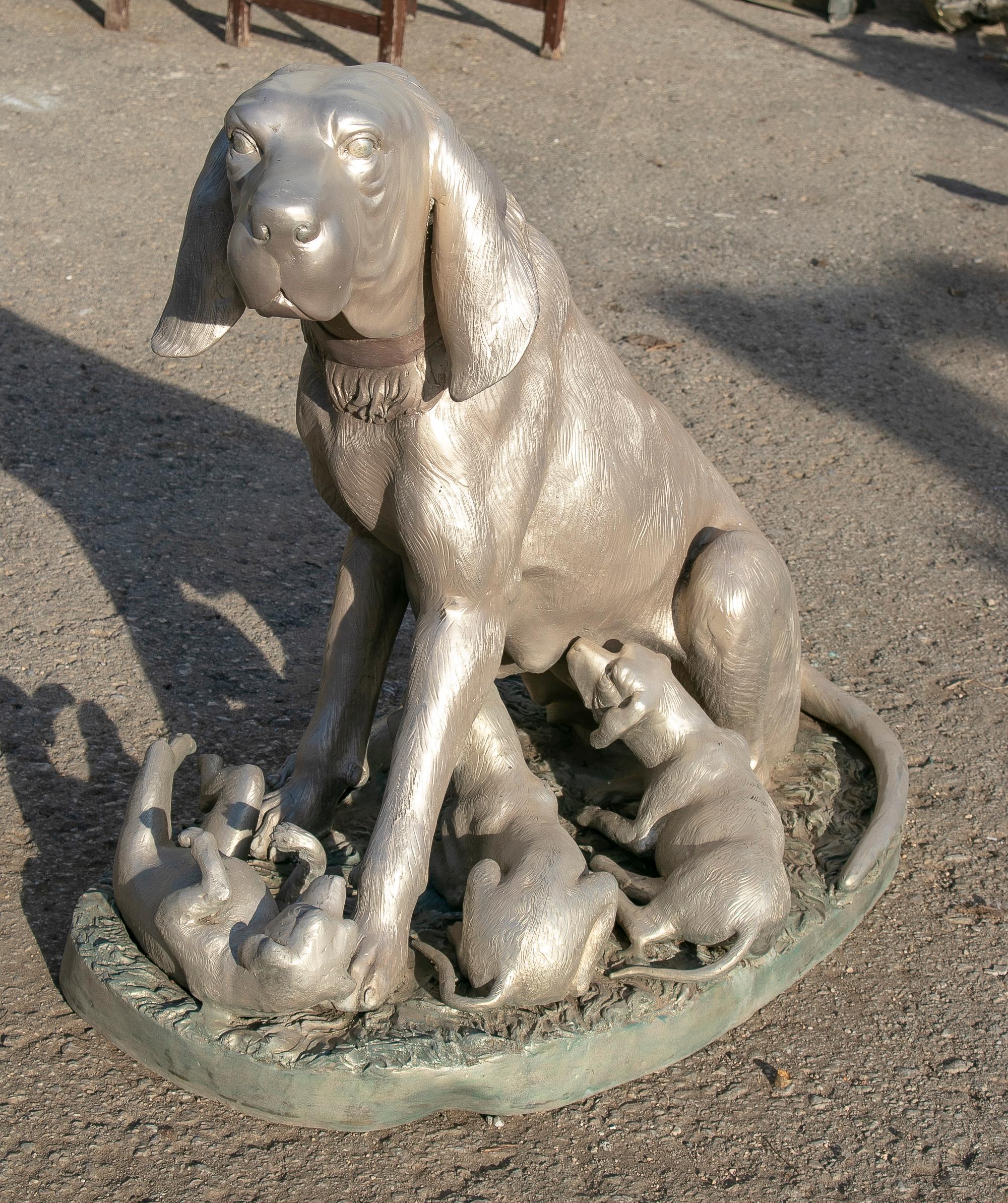 1980s life-size dog with cubs bronze sculpture.
  