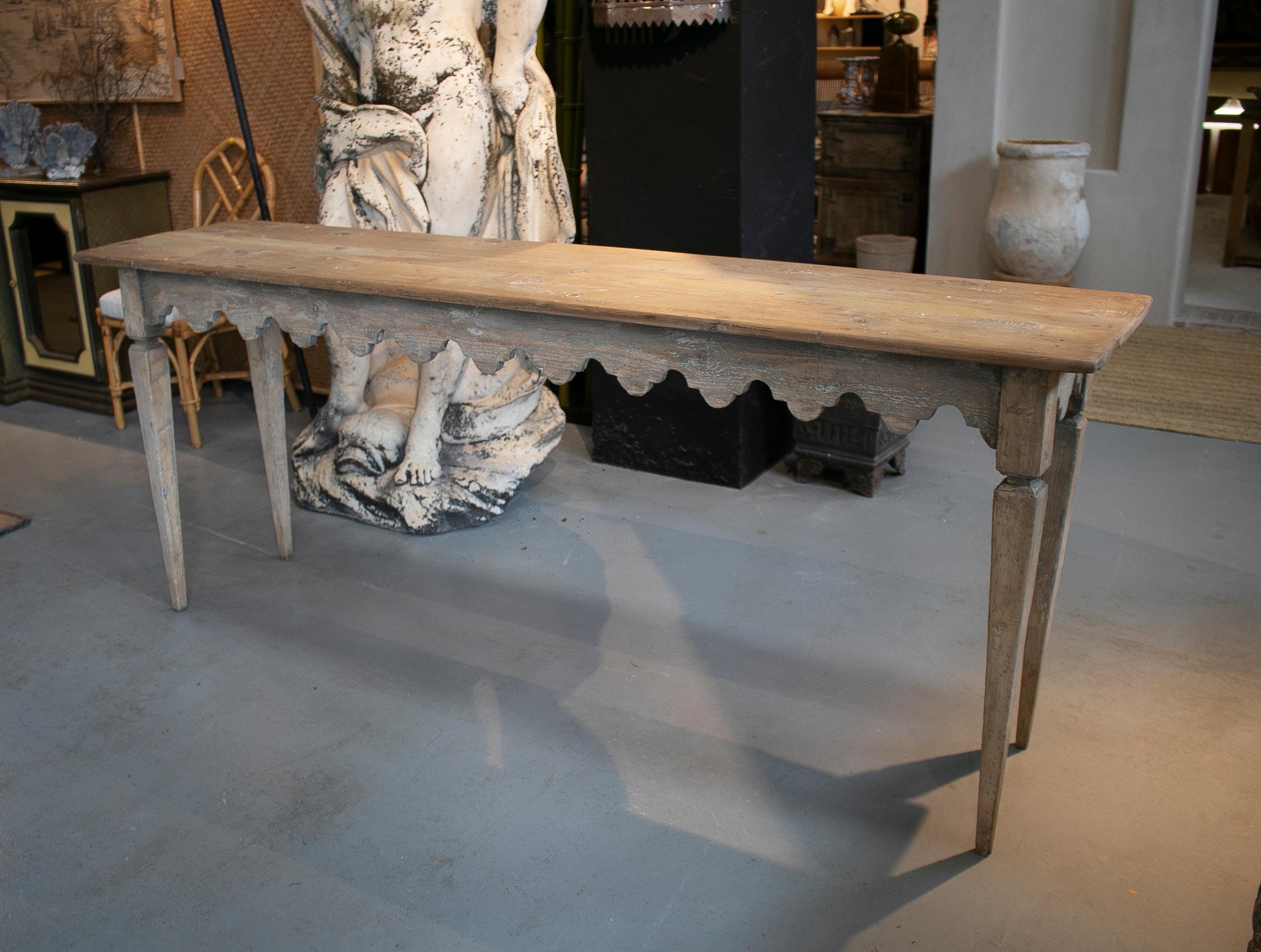 Rustic 1980s lime washed wooden console table with ornamental geometric skirt.