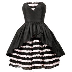 1980's LORIS AZZARO black and pink Haute Couture mini dress with lace ruffles