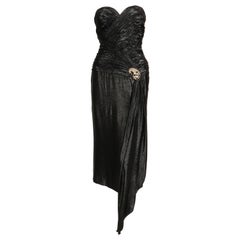 Robe ruchée noire métallisée ornée de perles LORIS AZZARO des années 1980