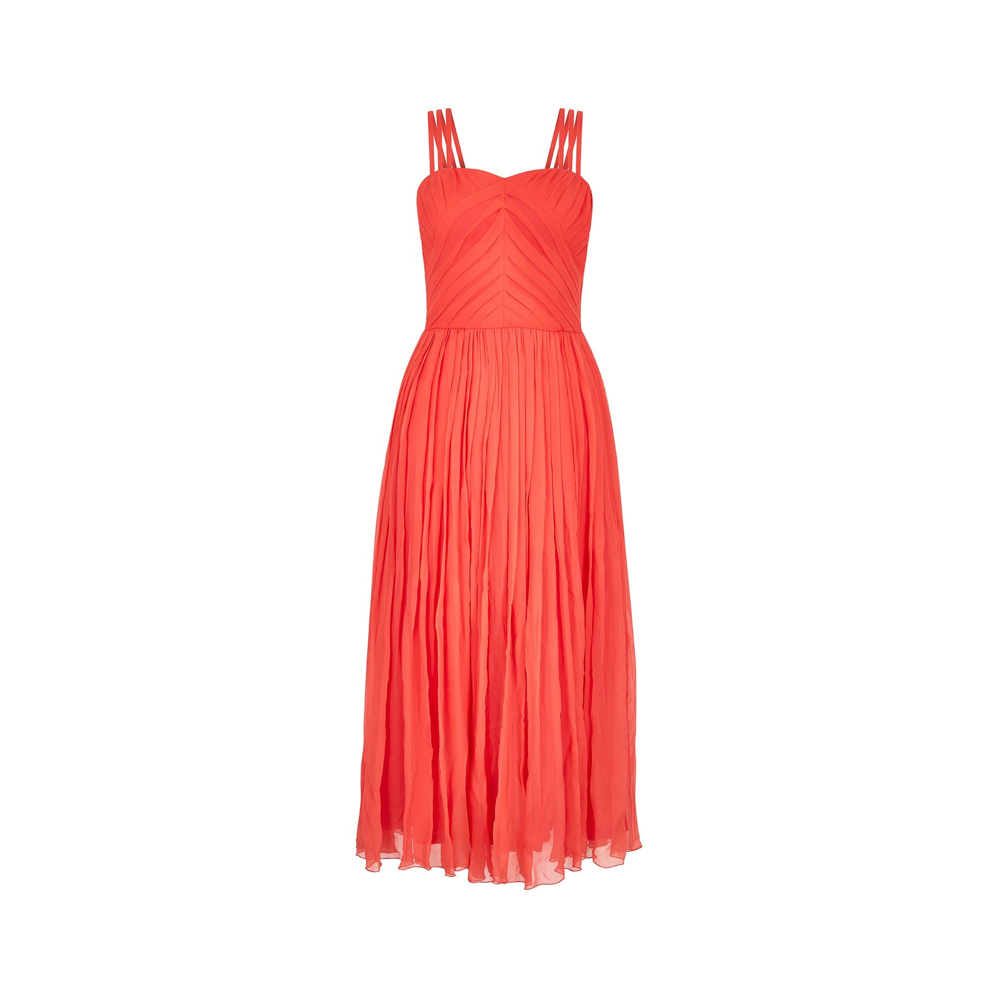 This is mid to late1980s midi dress by Louis Feraud is perfect for an occasion or summer party. It has a fitted ruched bodice and a sweetheart neckline, with lovely pleated shaping to the bust area, finished off with triple spaghetti straps to