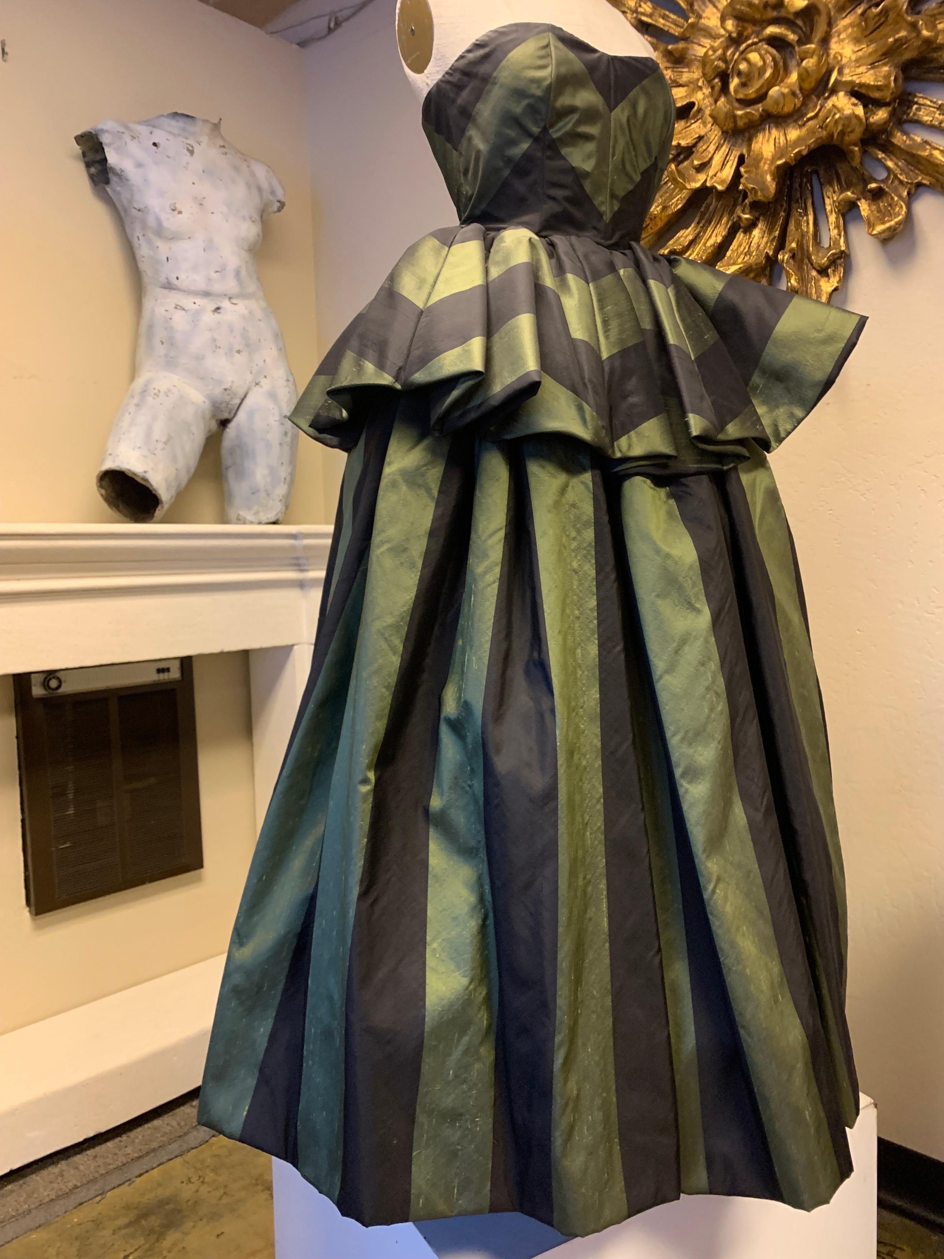 1980s Louis Feraud Green & Black Silk Taffeta Strapless Ballgown w Peplum: A bold, unforgettable stripe with wonderful mitering of pattern in peplum and bodice. Boned and heavily constructed bodice. Very full skirt can be worn with large crinoline