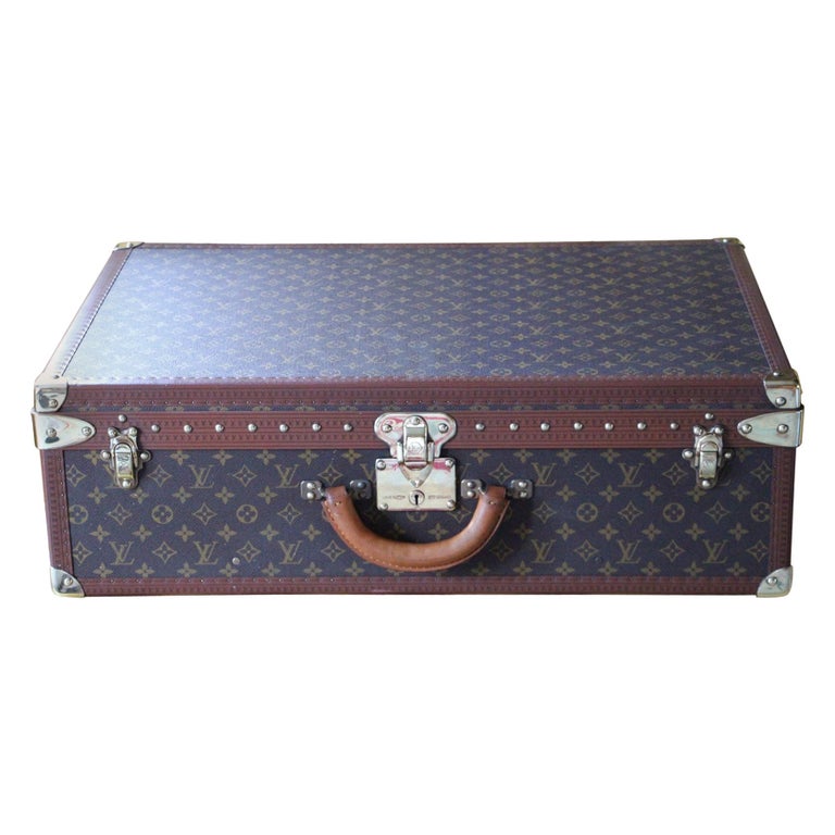 A 1980s monogram canvas suitcase by Louis Vuitton. - Bukowskis