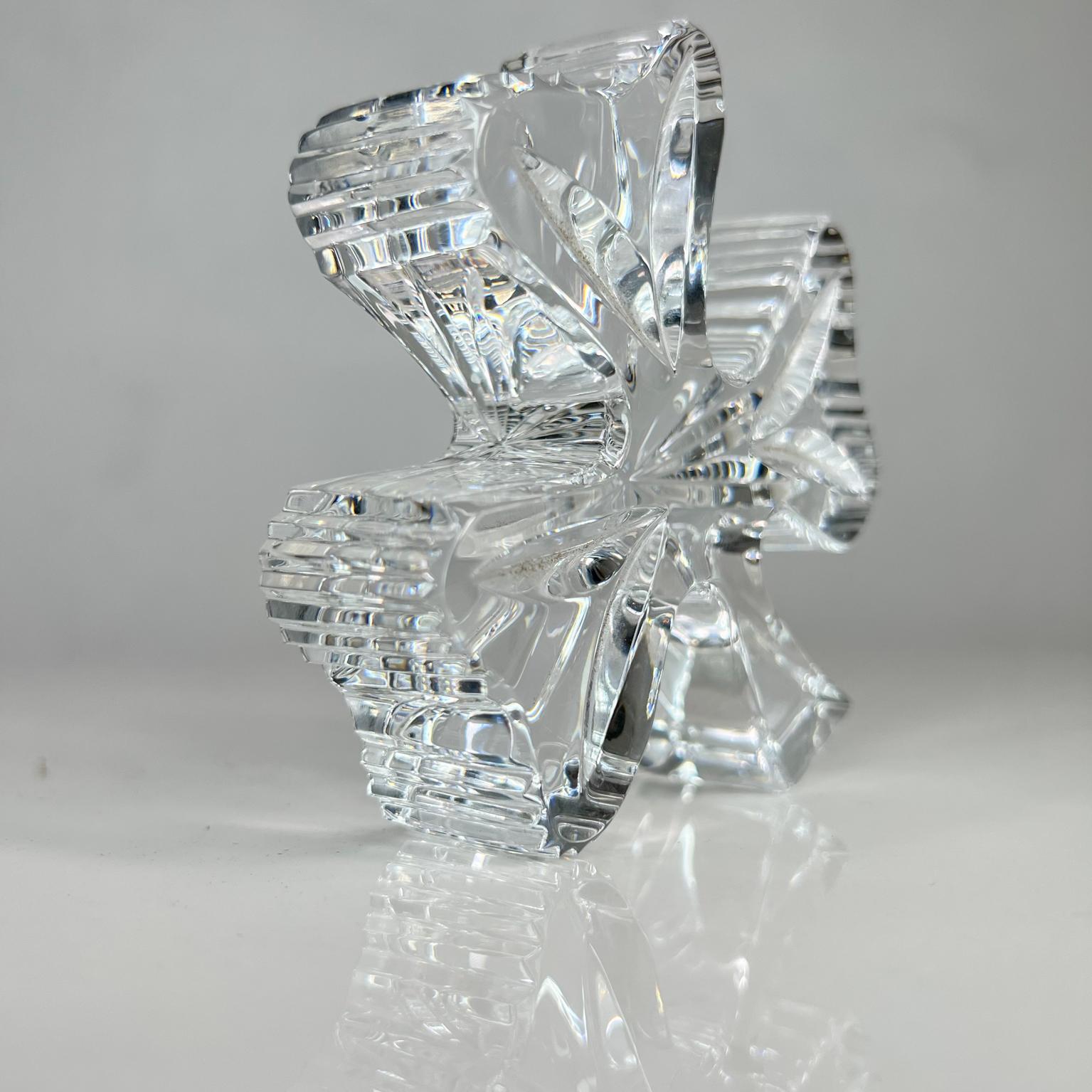 Shamrock paperweight.
1980s Lovely waterford crystal glass lucky Irish Shamrock paperweight. 
Maker stamped Waterford made in Ireland.
Preowned very good vintage condition.
Please see images provided.
approximately 4 H x 4 W x 1 inch D.
