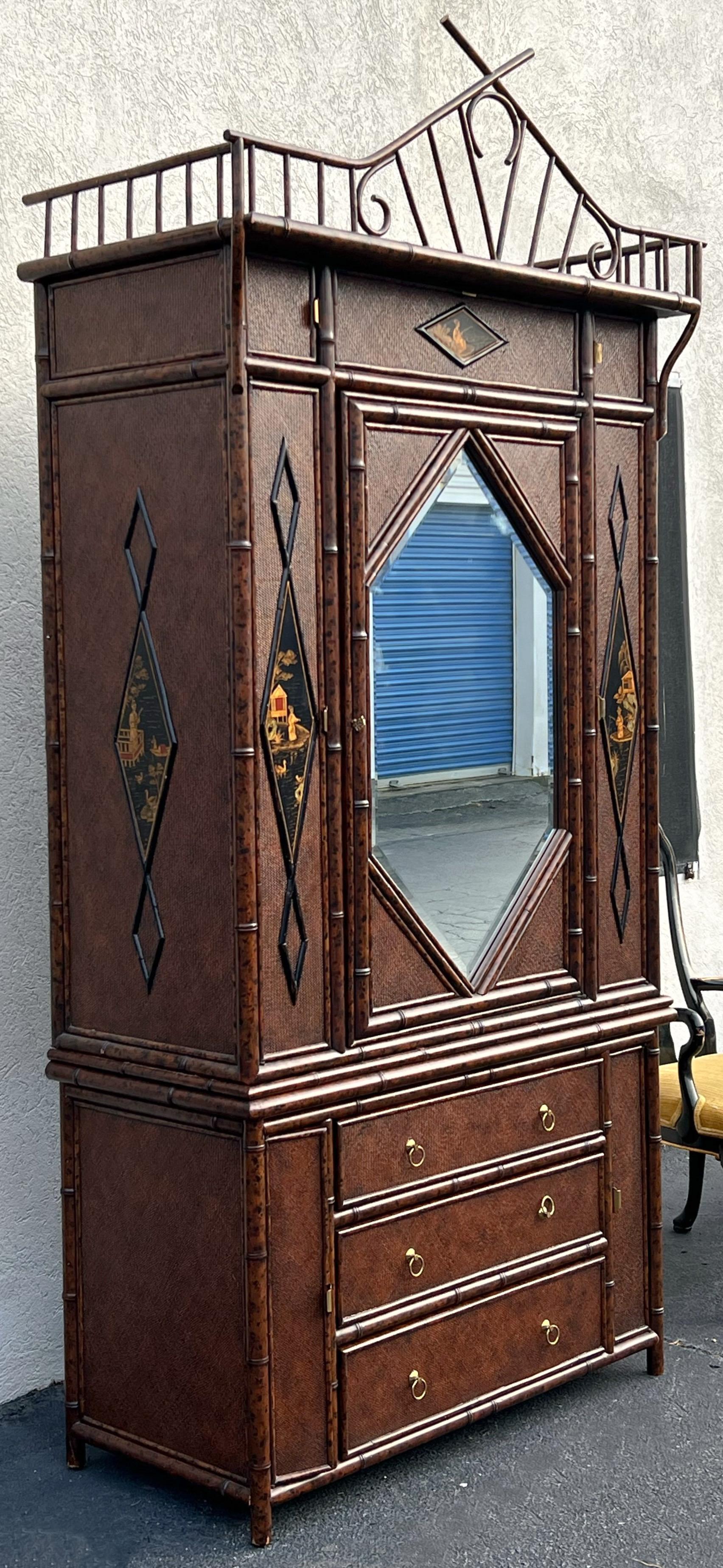 This is a large scale Maitland-Smith faux burnt bamboo armoire. This has English styling with its lacquered chinoiserie painted panels. The armoire has quite a bit of storage options too. It is in very good condition. 

This may require extra