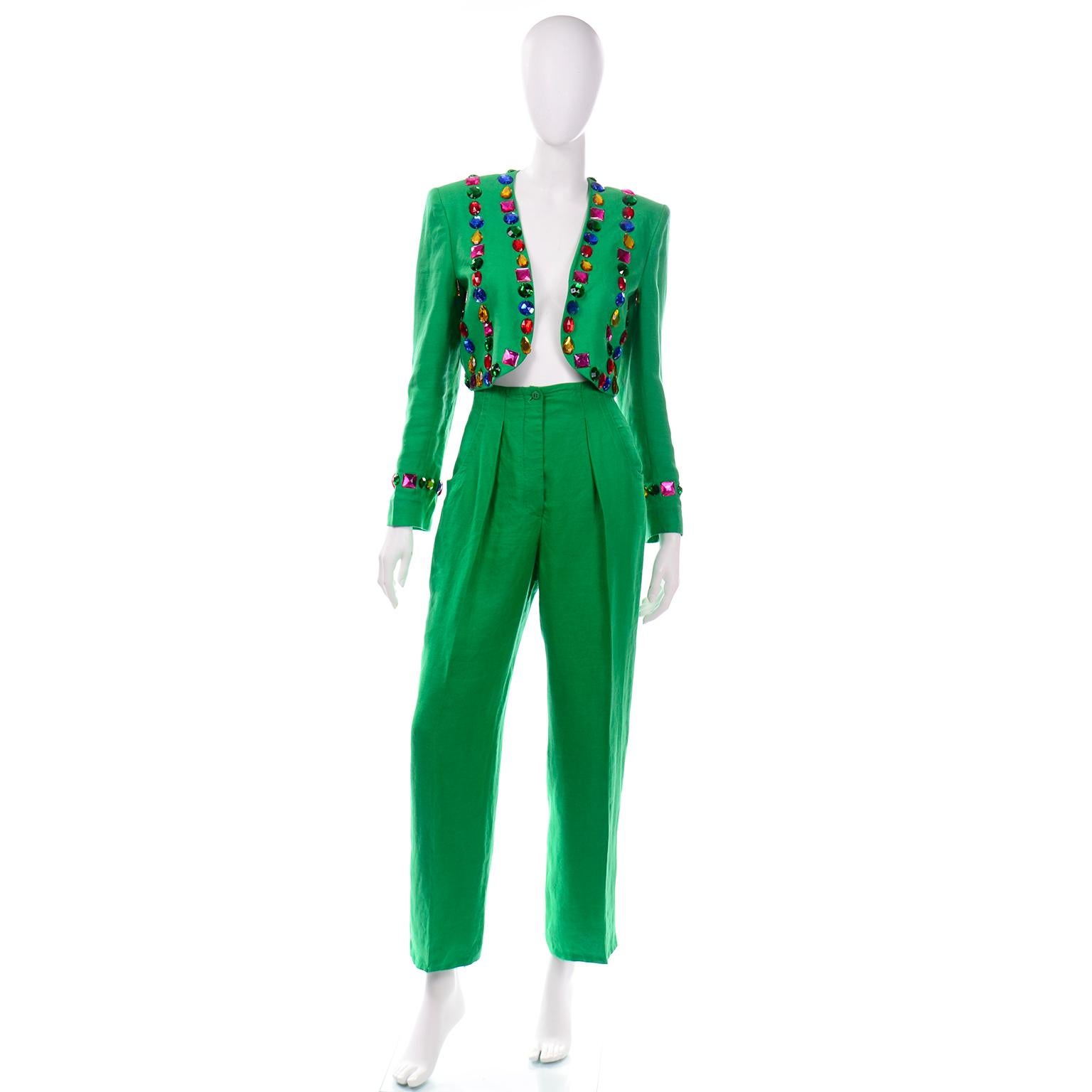 This 1980's Margaretha Ley for Escada green bolero jacket linen pant suit is so fabulous! The cropped, open front bolero jacket has shoulder pads for structure and colorful large scale faux gemstones in a variety cuts and colors, including pink,