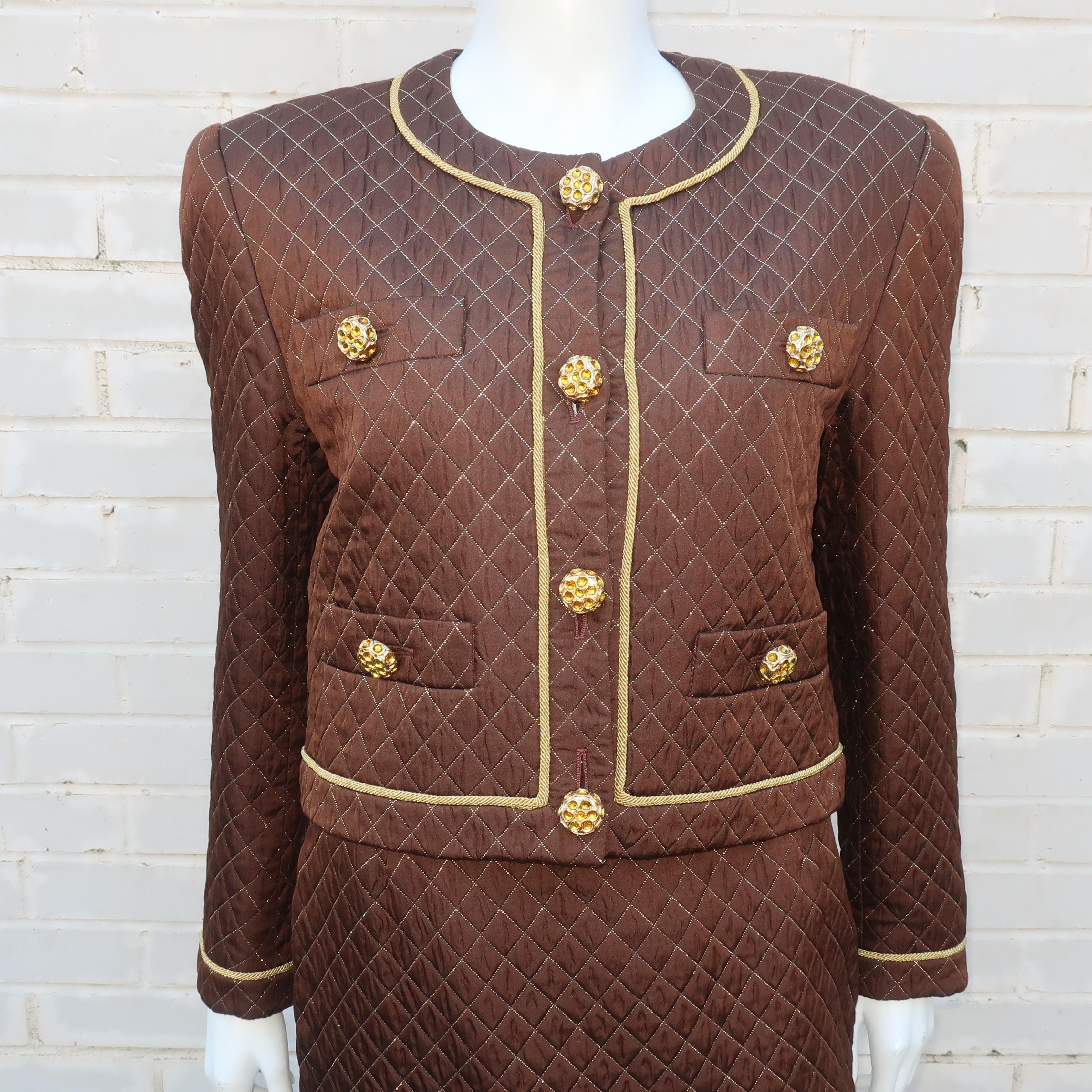 Some of the most beautiful power suits of the 1980's sprung from the artistic mind of Margaretha Ley and her Escada label.  This two piece suit features a cropped jacket and coordinating skirt in a brown silk blend fabric glamorously quilted with