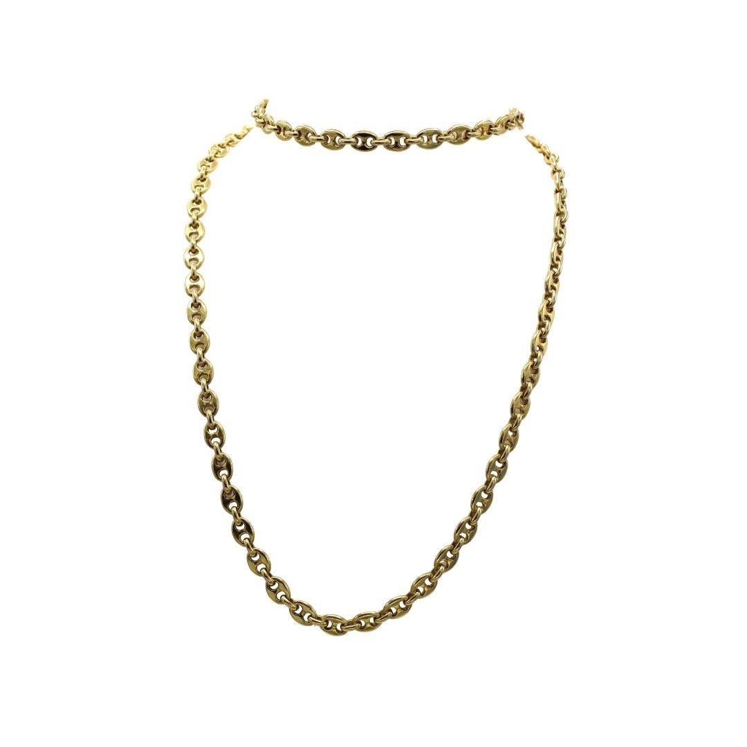 Chic 1980s 33 inch mariner link 18 karat yellow gold chain. Can be worn at full length or doubled as a choker. An elegant and cool wear for every day and any occasion.