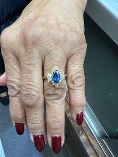 1980s Marquis Sapphire Diamond 14k Yellow Gold Cluster Ring