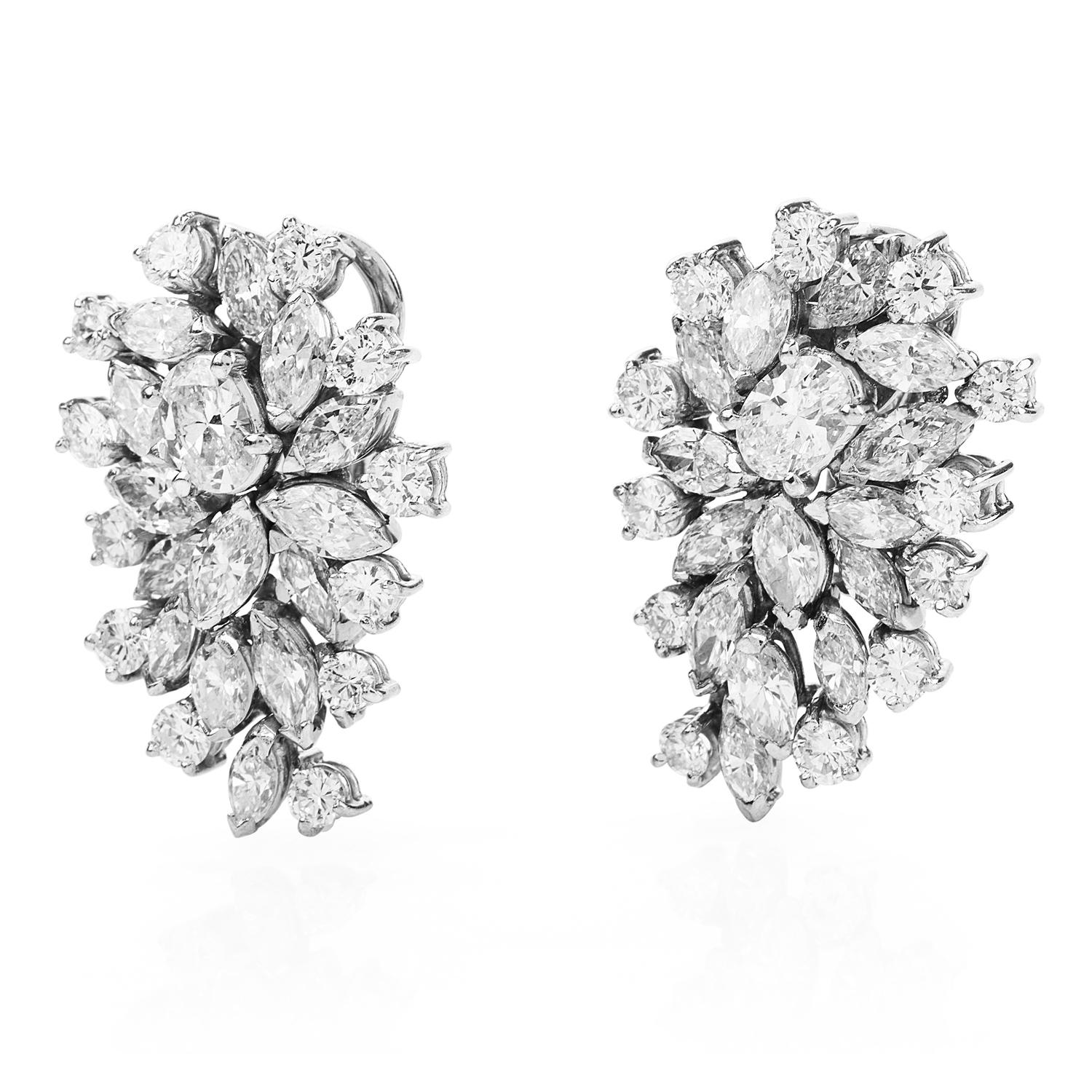 Add some gleaming beauty to your life with these elegant Diamond Platinum Marquise, Round Cut, and Oval Cluster Clip Back Earrings!  

These alluring earrings boast 60 genuine natural diamonds with marquise, oval, and round-cut, totaling
