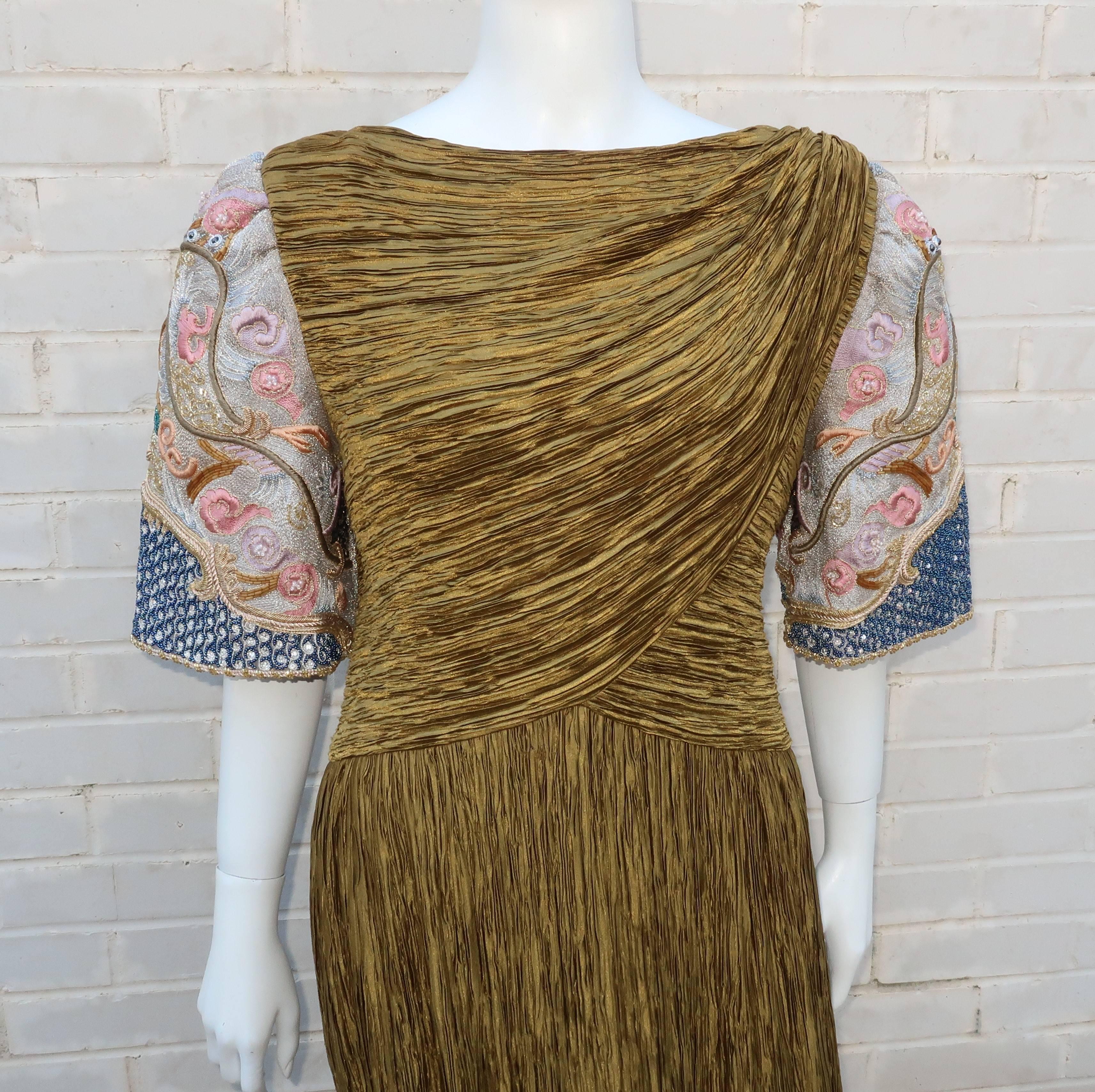 The crowd will part when you make an entrance in this stunning Mary McFadden Couture evening dress.  This lovely dress incorporates Mary McFadden's signature exotic style and micro pleated fabric similar to the designs of Mario Fortuny.  The olive