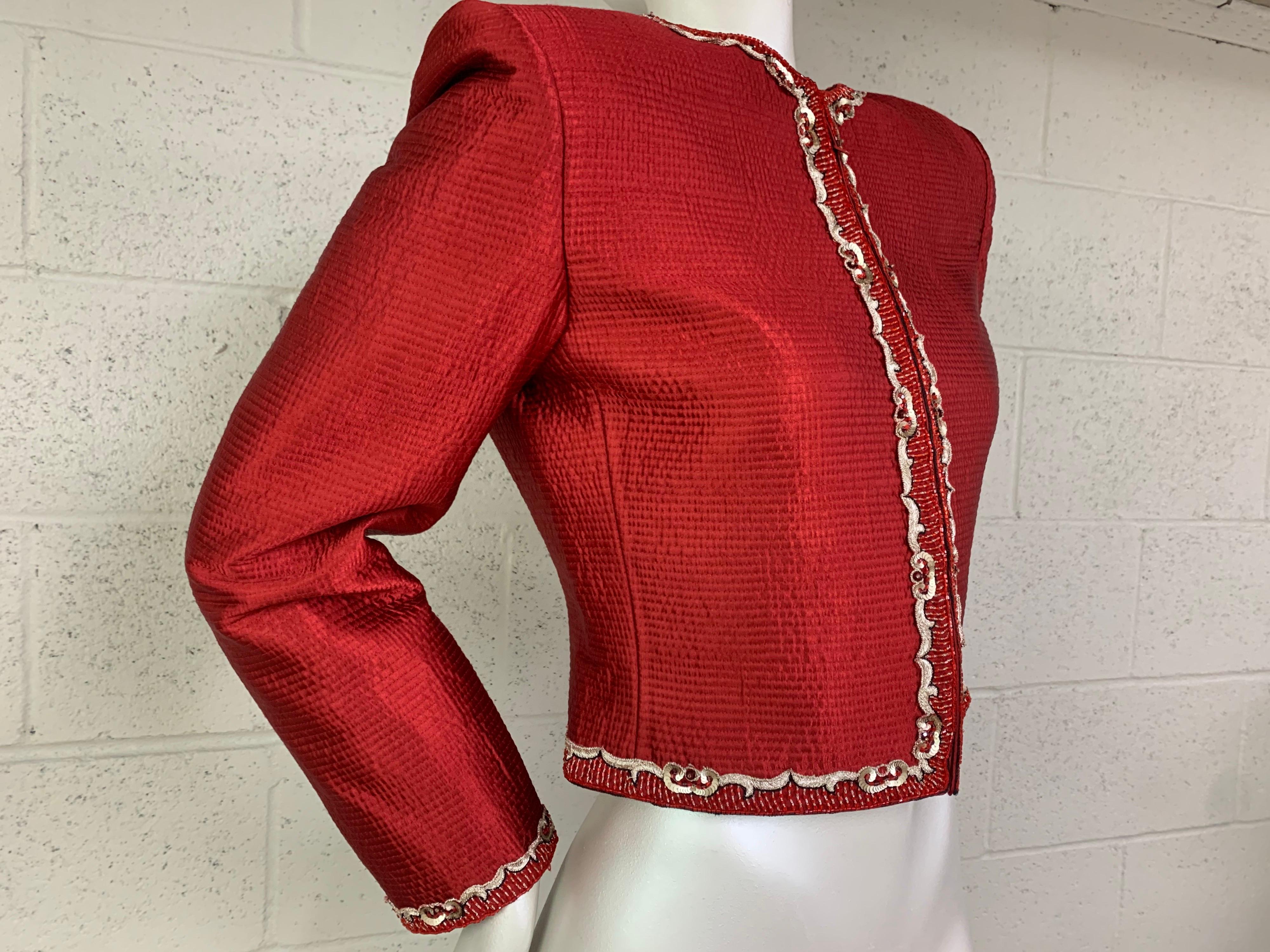 A stunning 1980s Mary McFadden Couture red textured silk zip-front jacket with a strong shoulder silhouette and embroidered tracery trim. Originally purchased at Bergdorf Goodman. Size 10. 
